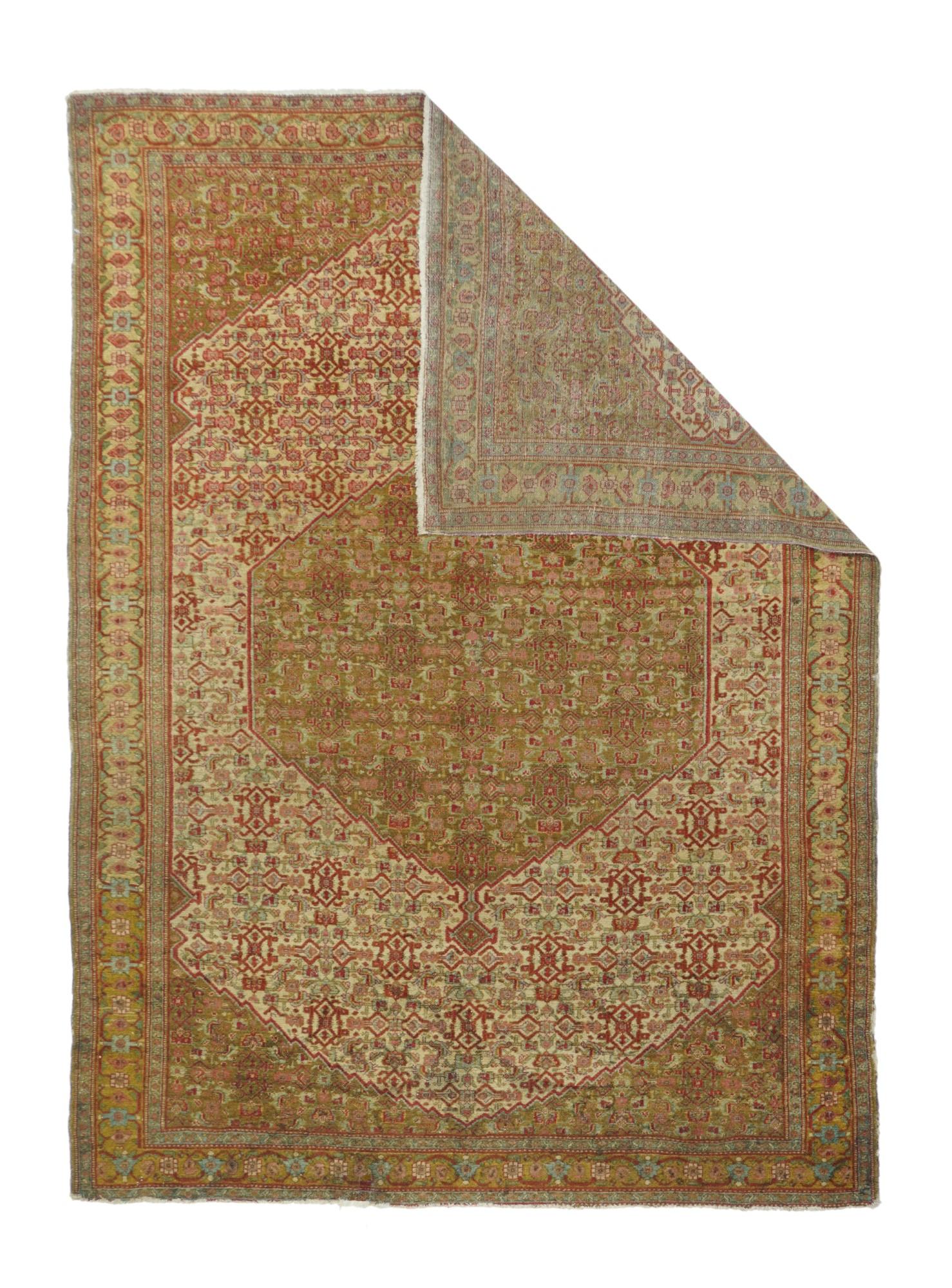 A uniform Herati design, varying only in color distribution, covers the hexagonal medallion, triangular corners and sandy-straw field of this well-woven western Persian Kurdish town rug from the seat of Kurdistan province, Sanandaj. The straw main