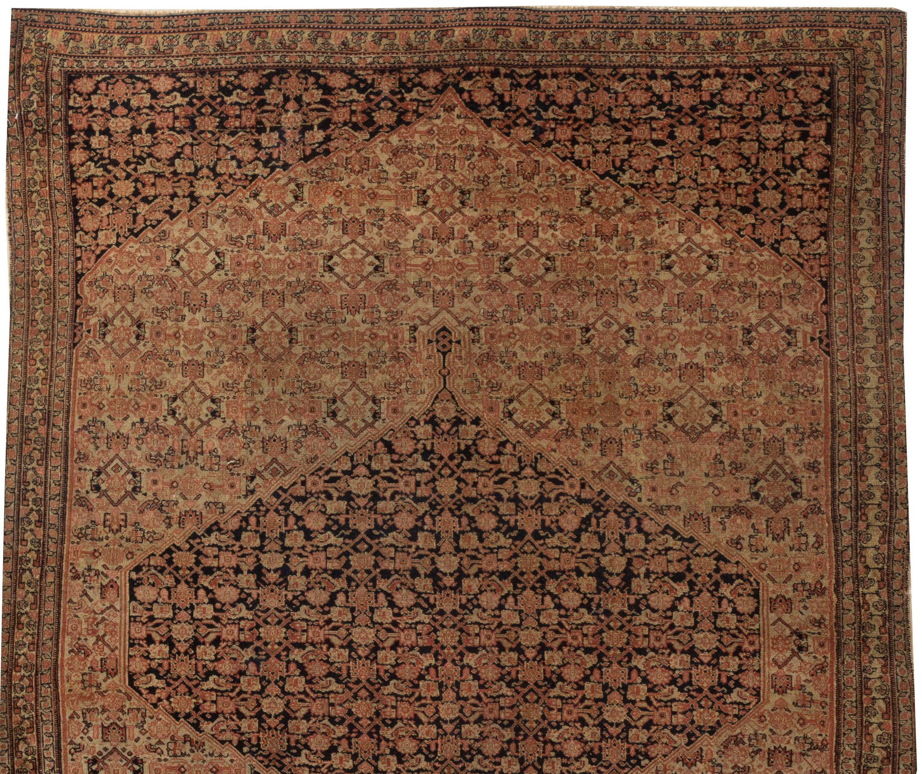 Antique Senneh rug, circa 1880. From the town of Senha (Sanandaj) in Kurdistan come antique rugs that attain nearly miraculous fineness and suppleness. And they are rugs, almost never room sizes or runners. The attention to detail in the weaving in