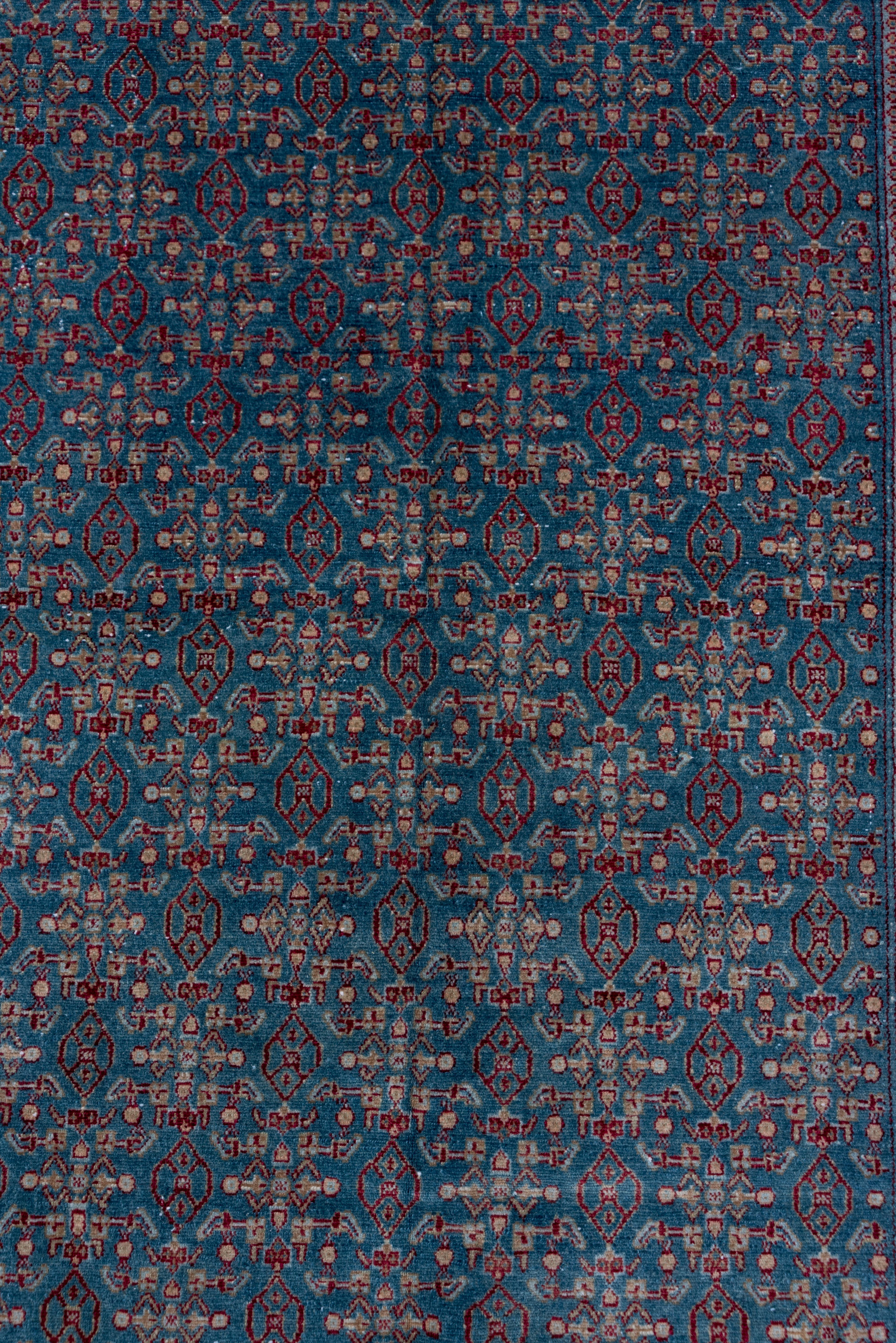 Wool Antique Senneh Rug – Repeating Herati Pattern on Blue Field For Sale