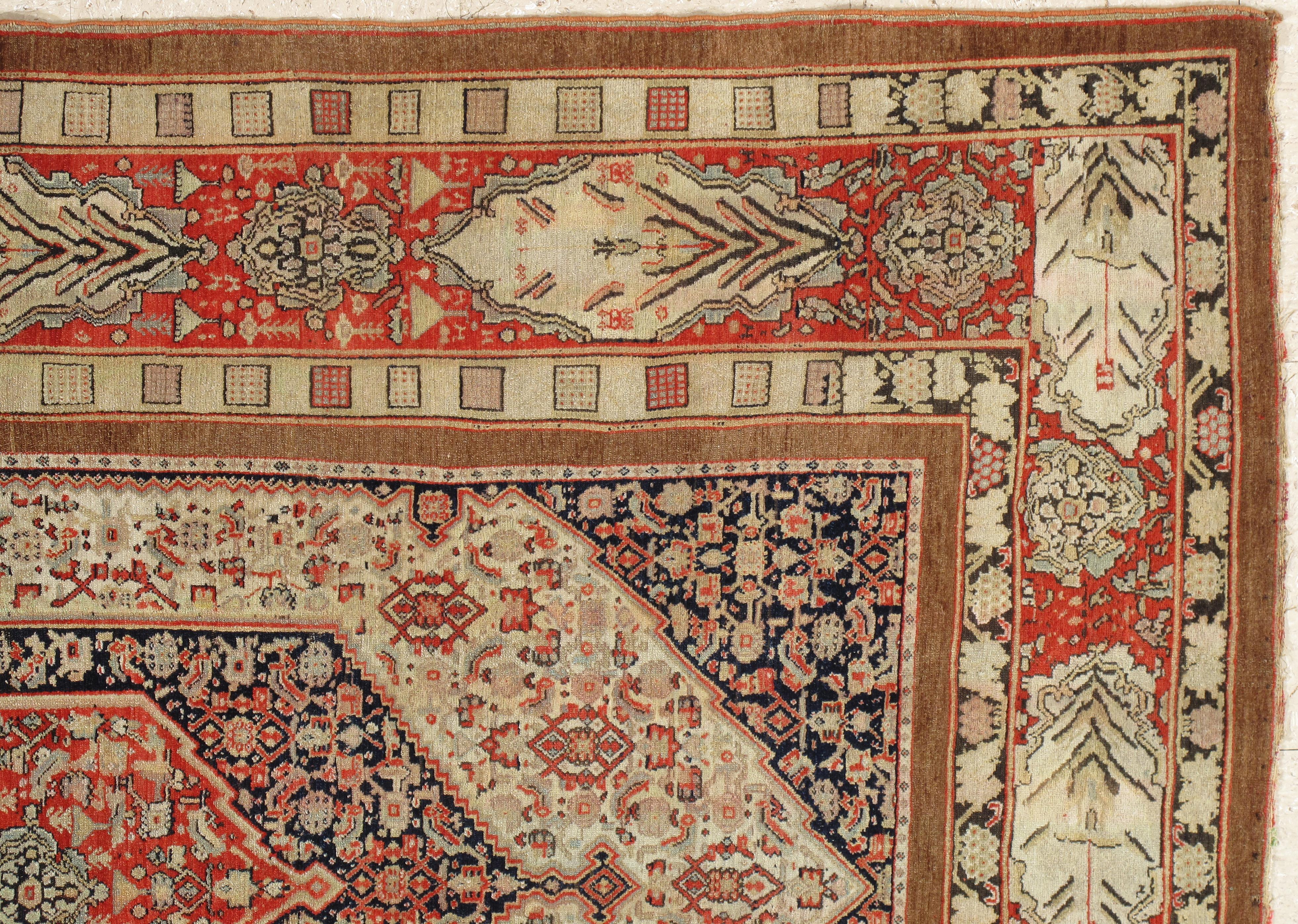 Antique silk warp Senneh woven in dark earth tone colors. Silk warp Sennehs are often referred to as 