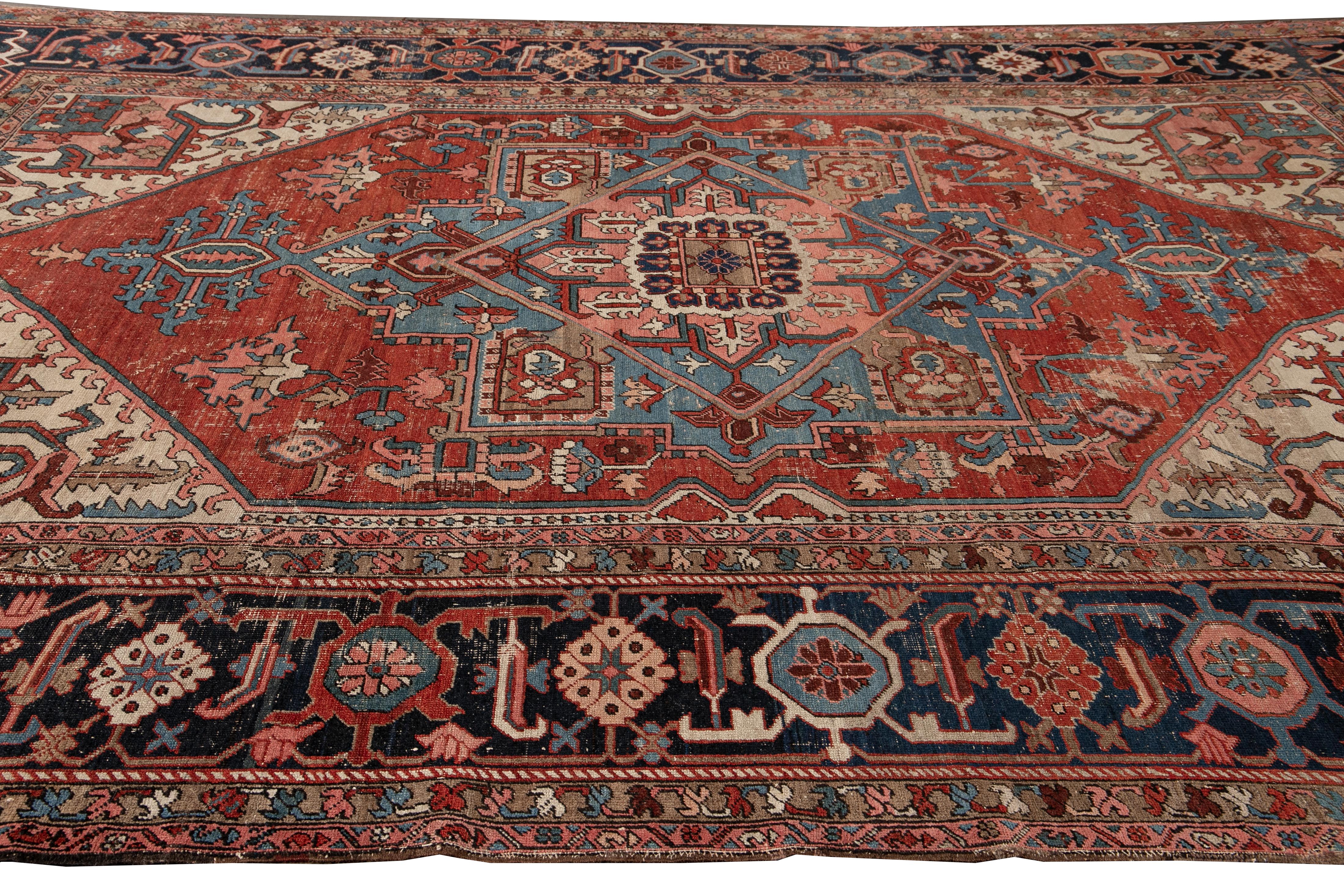 Antique Serapi Red Handmade Medallion Floral Wool Rug In Distressed Condition For Sale In Norwalk, CT