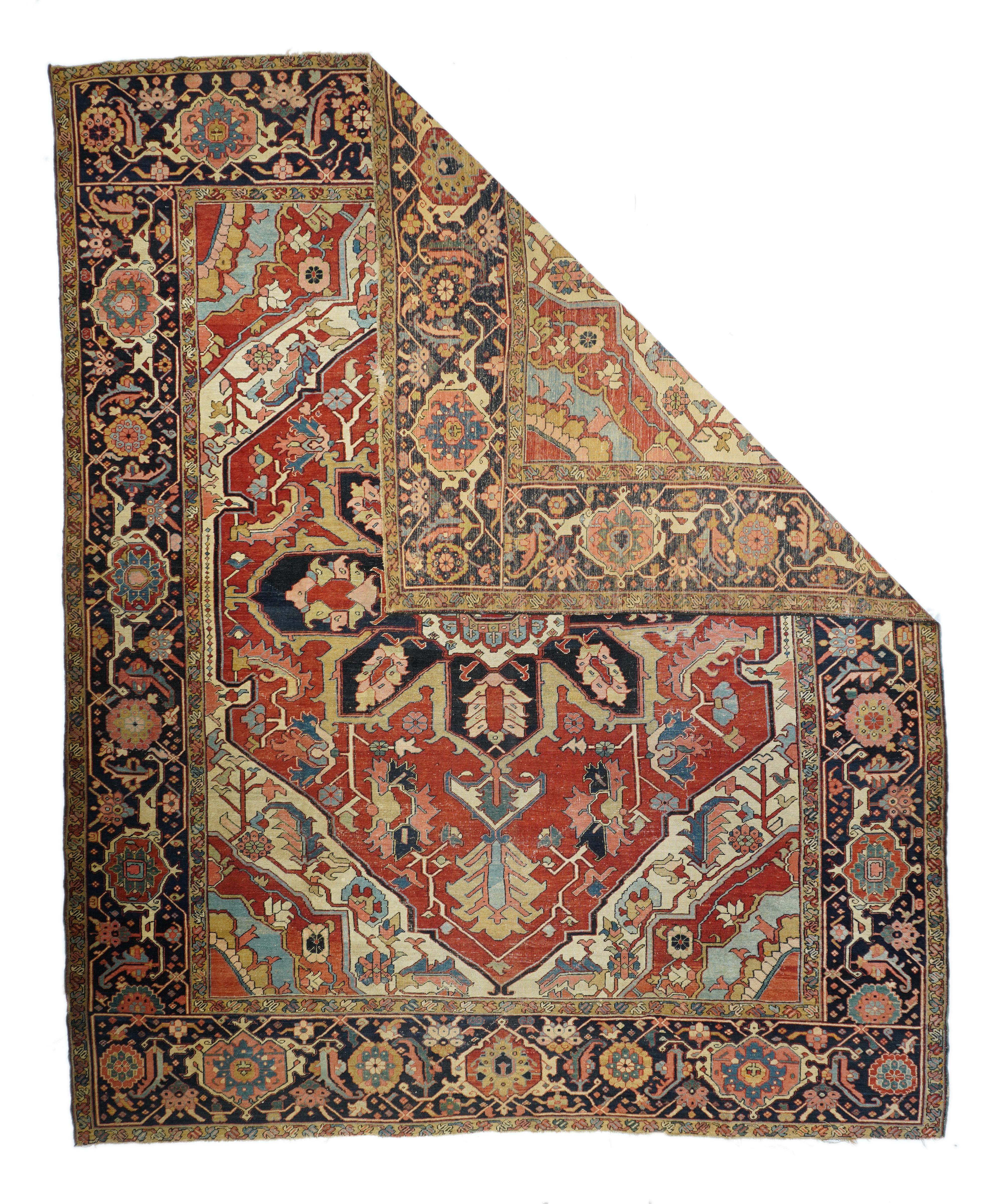 Antique Serapi rug measures 10' x 12'3''. This antique NW Persian village carpet shows the characteristic red/navy/cream palette manifested in an equally pattern of a powerful eight palmette navy octofoil medallion with a ragged cream sub-medallion,