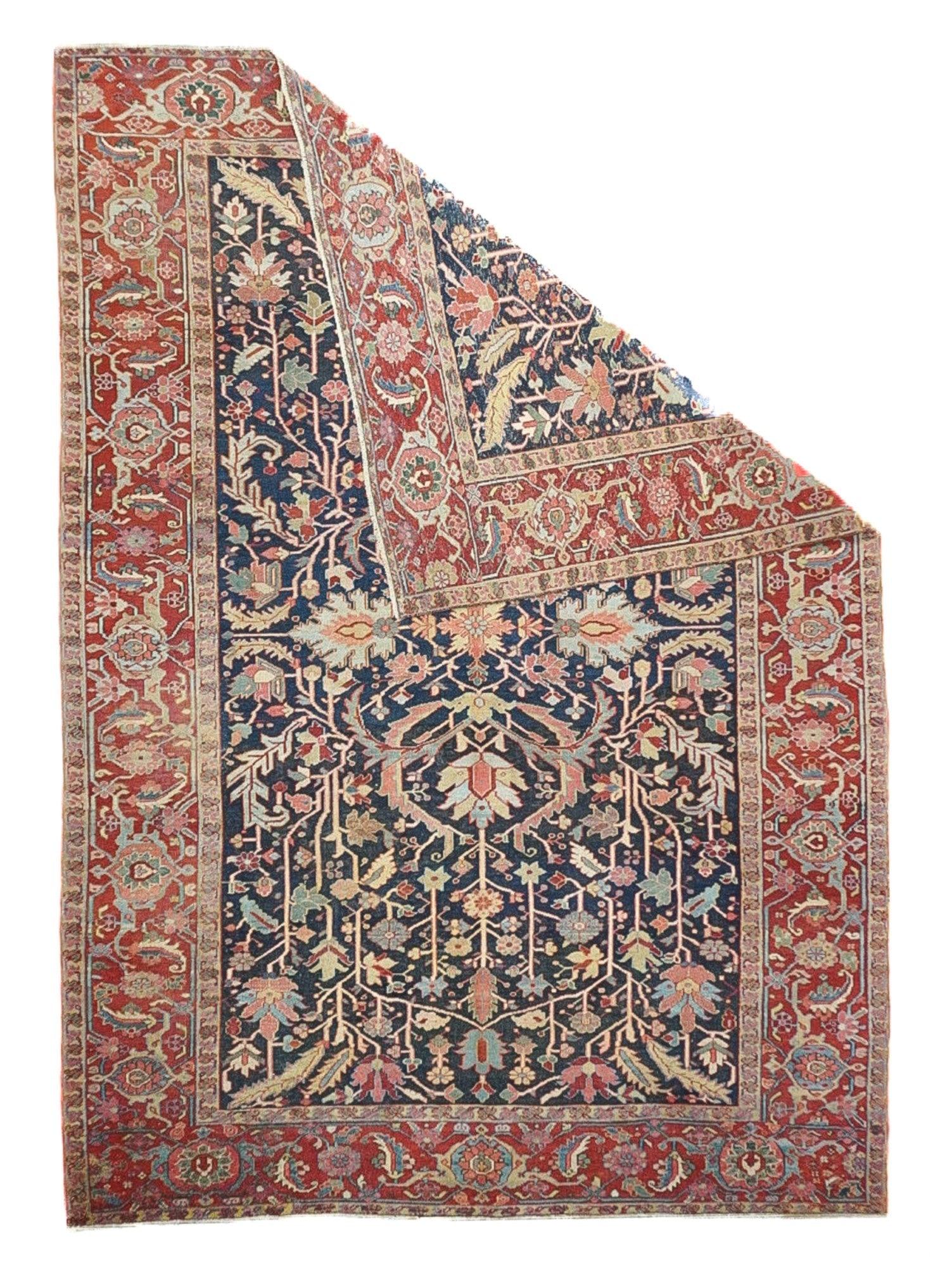 Antique Serapi Rug 8'8'' x 12'4''. A higher grade of Heriz carpets, usually in medallion designs, with crisp natural dyes, and primarily woven between 1900 and 1930. Red field, navy border is the most popular combination. Semi-geometric. No town of