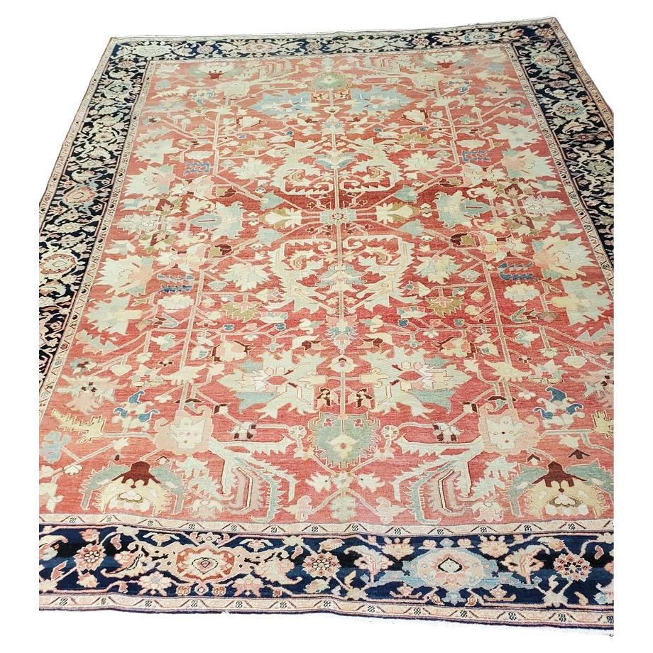 Antique Serapi Rug, Faded Red & Blue with Navy Border For Sale