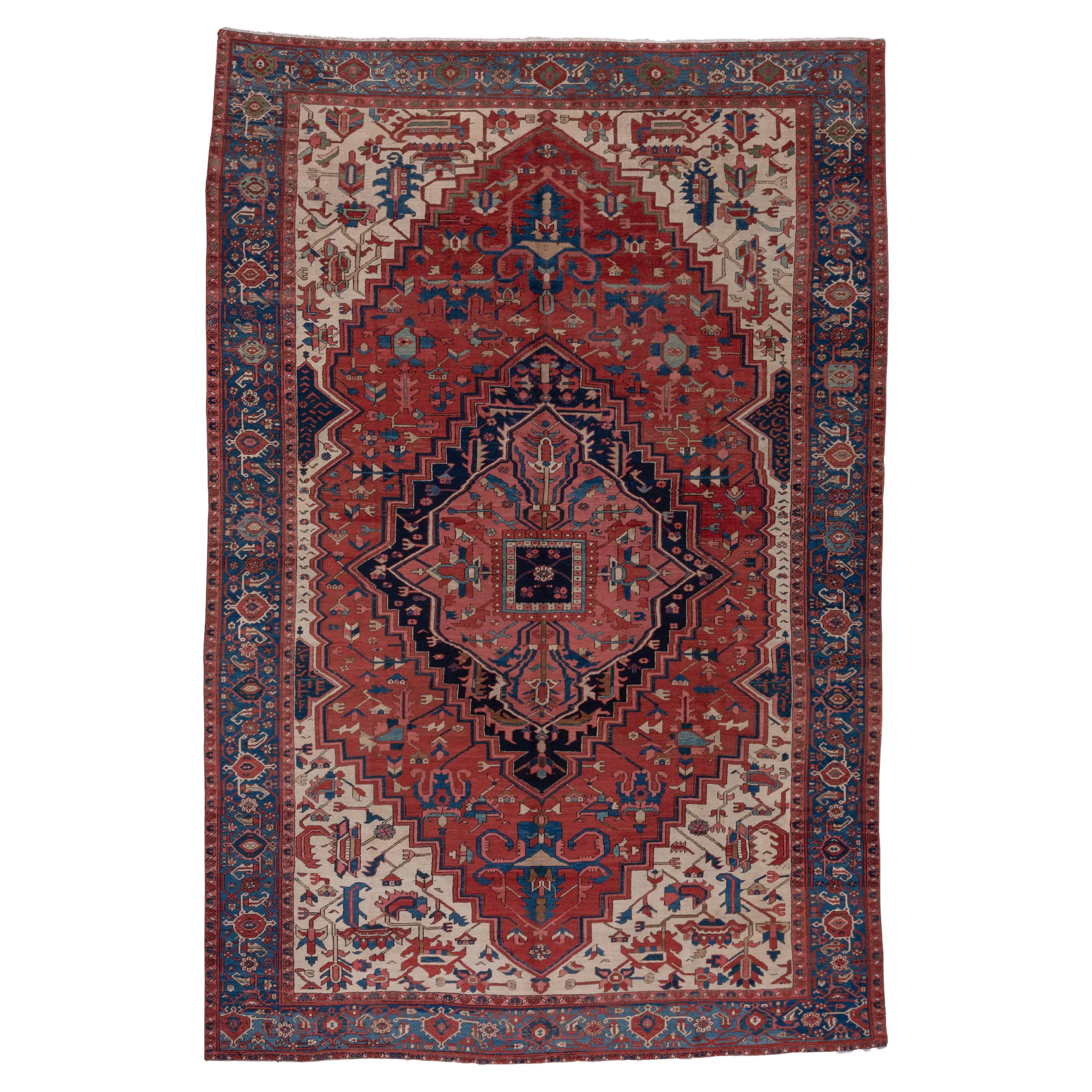 Antique Serapi Rug with Cream and Red Field and Corner Foliage For Sale