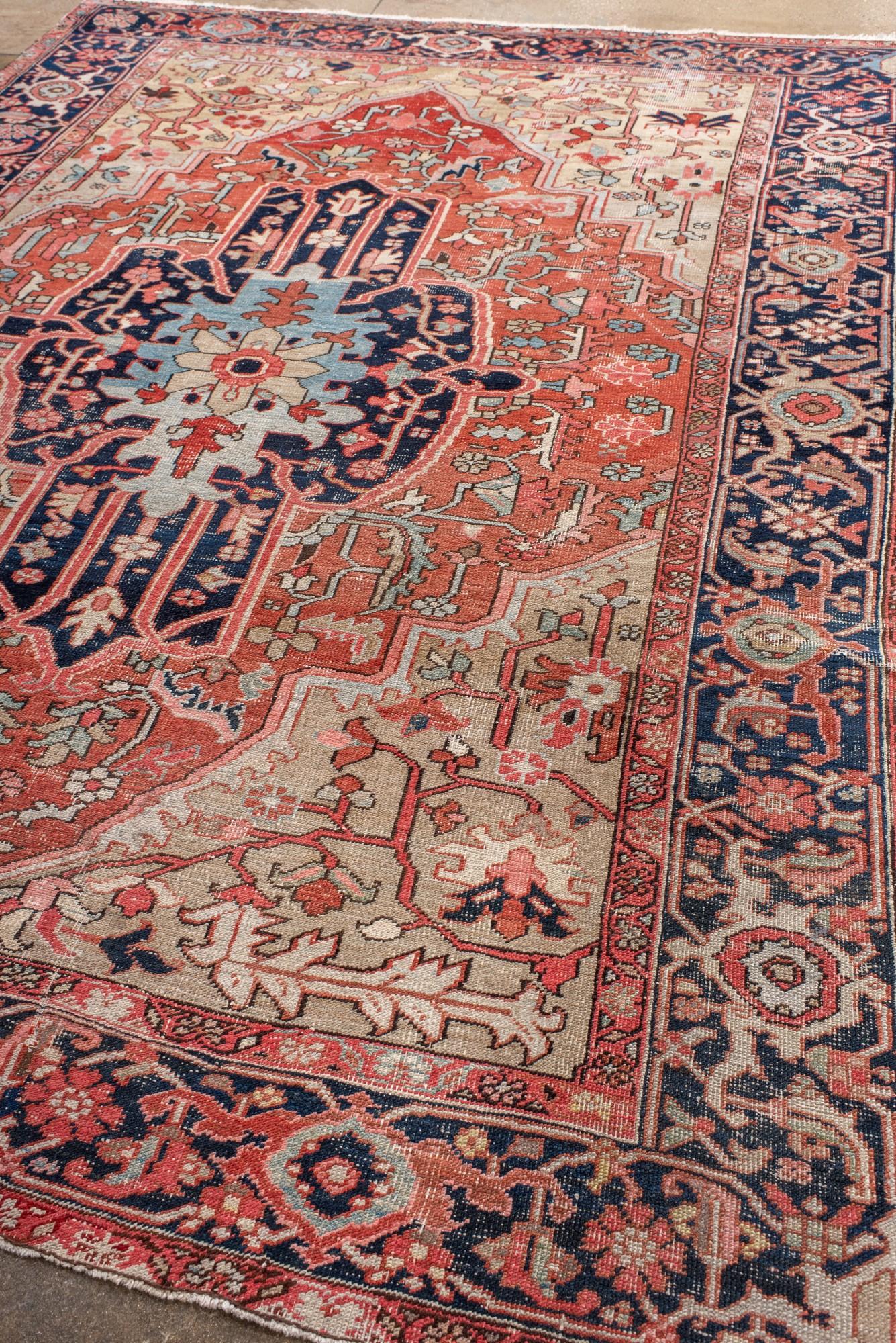 Persian Antique Serapi Rug with Radiant Medallion and Cream Corners For Sale