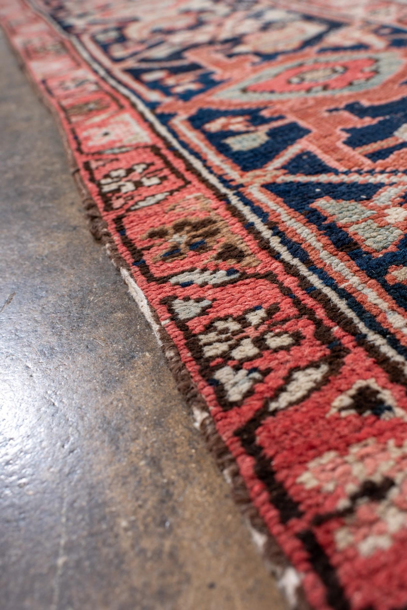 Wool Antique Serapi Rug with Radiant Medallion and Cream Corners For Sale