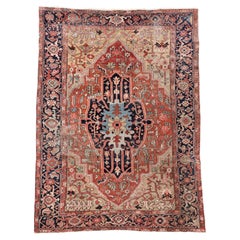 Antique Serapi Rug with Radiant Medallion and Cream Corners