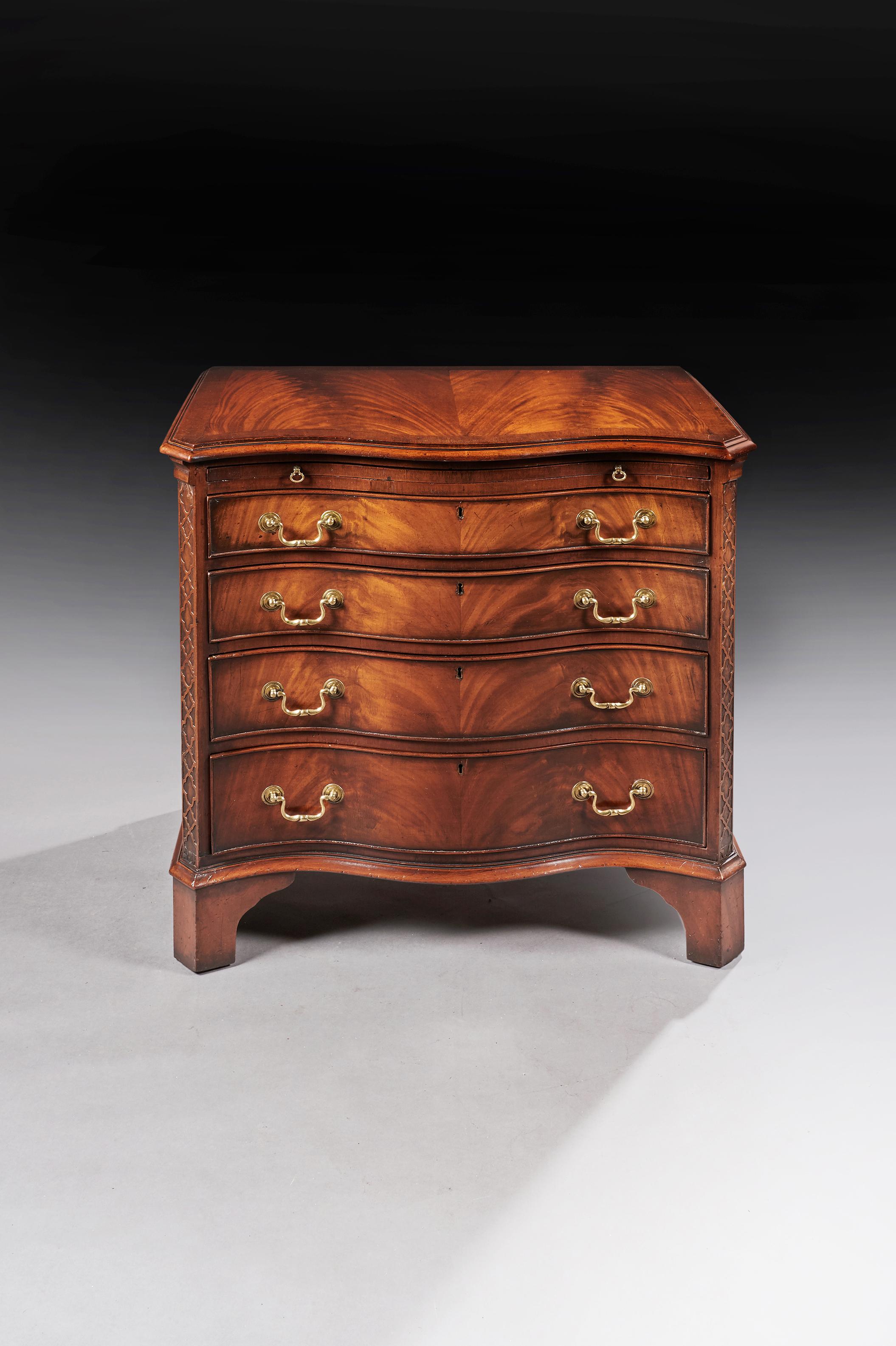 A very good quality antique serpentine mahogany chest of drawers of great color.

English circa 1900.

One of the best colored early 20th century chest of drawers we have had for sometime. 
Very well constructed, the serpentine book match