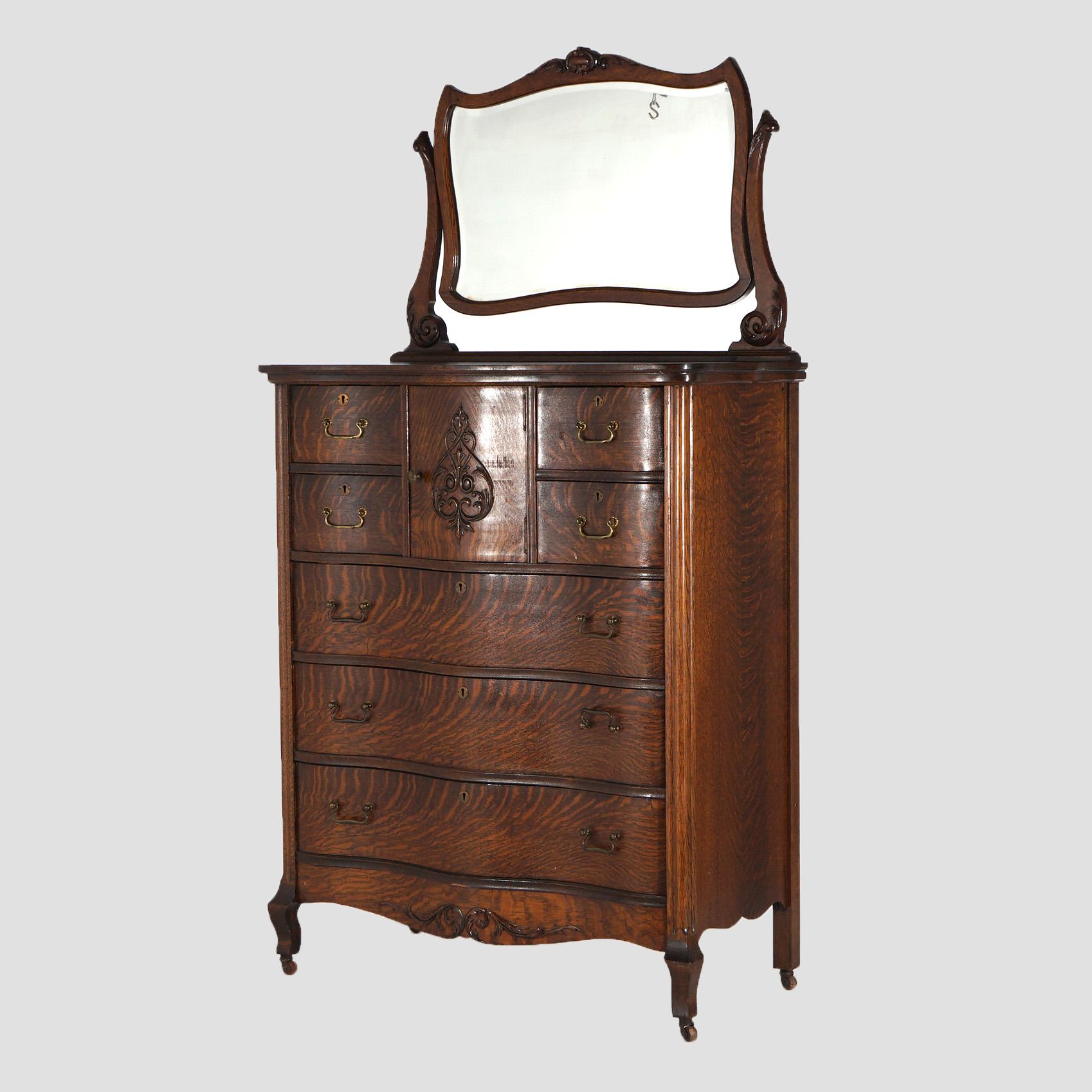 ***Reduced Delivery Rates - See Below or Click “Ask The Seller” to Request a Quote***

Antique Serpentine Quarter Sawn Oak Chiffonier Highboy Dresser with Hat Box, Carved Foliate Elements & Shaped Mirror C1900

Measures - 74