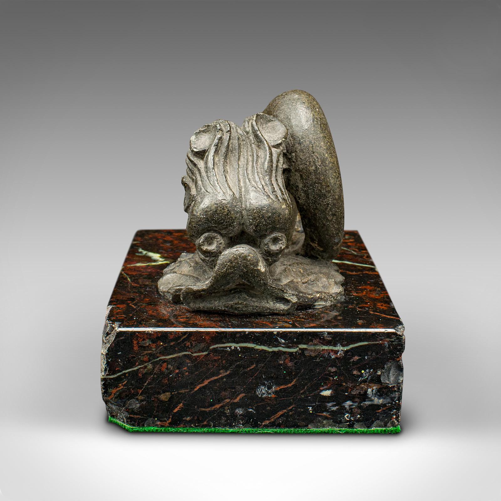 This is an antique serpentine paperweight. A Chinese, stone and marble dragon fish figure, dating to the early Victorian period, circa 1850.

Distinctive and tactile Oriental taste, with appealing originality
Displays a desirable aged patina