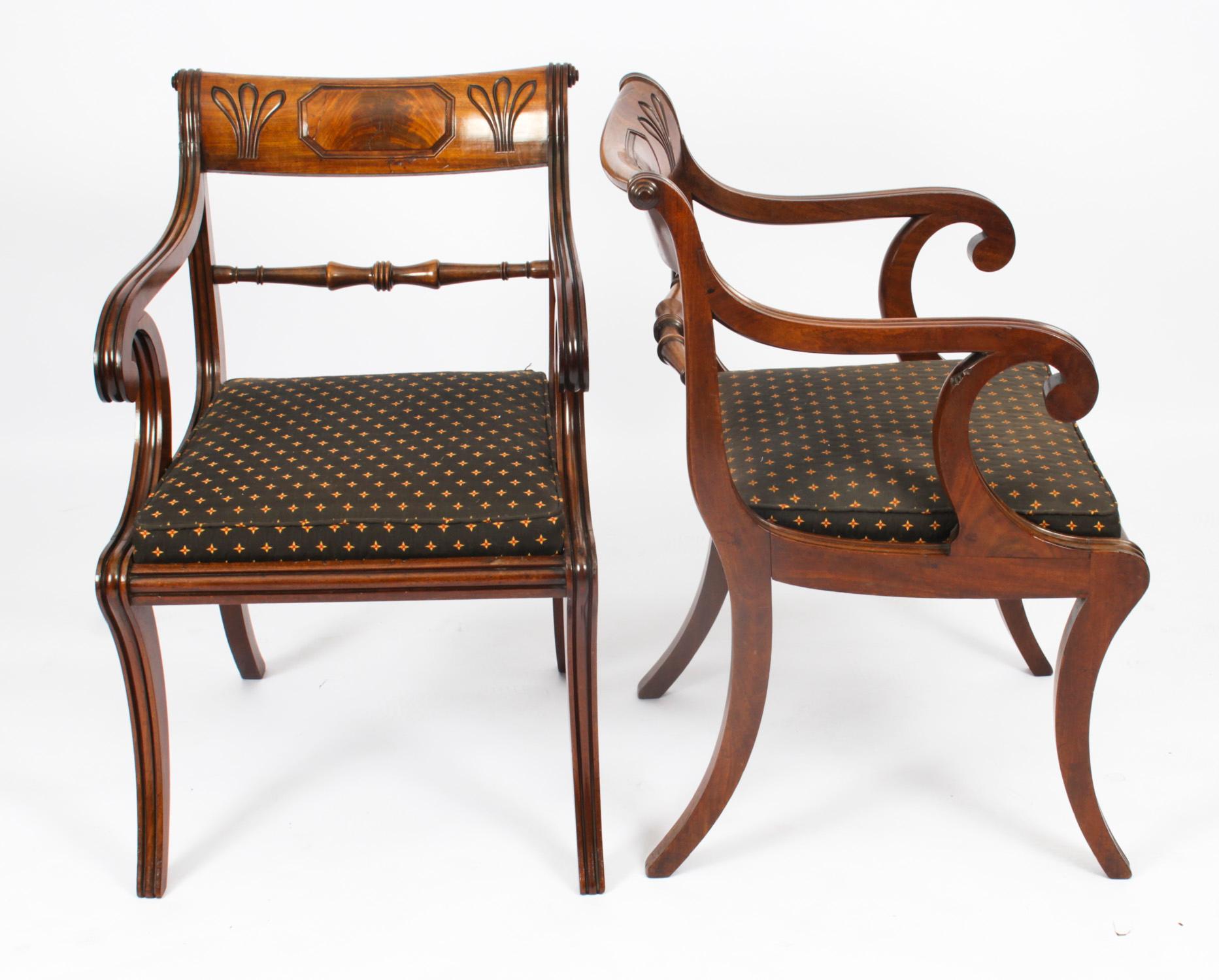 A fabulous set of ten Scottish Regency Period mahogany dining chairs, Circa 1815 in date.
The set comprising eight side chairs and two armchairs, each with a curved, dished and scrolled toprail with a central raised octagonal tablet flanked by