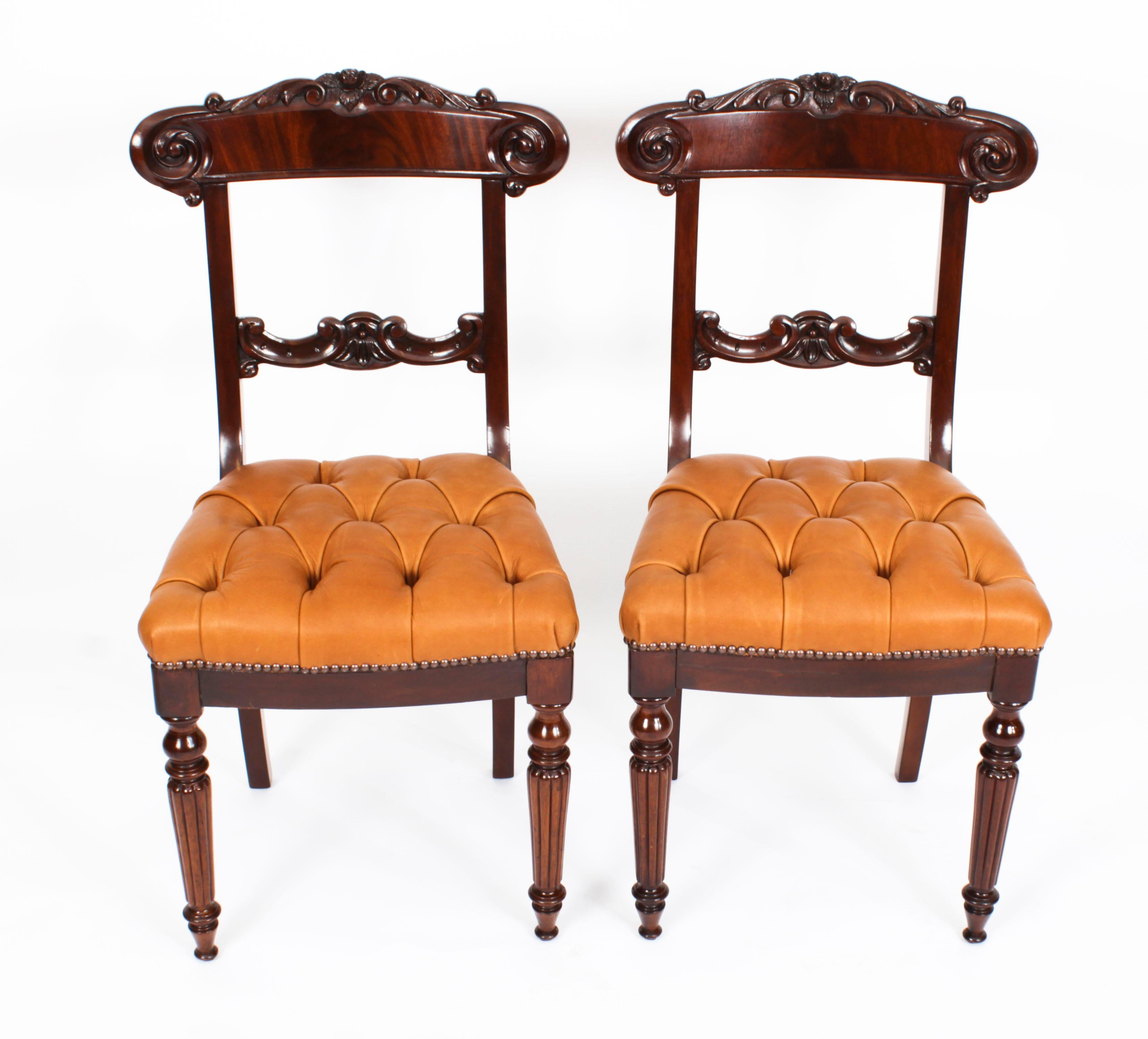 A superb set of twelve William IV flame mahogany dining chairs, Circa 1830 in date.
 
The set comprising two open armchairs and ten single chairs, each with leaf carved top rail and cross section above upholstered over stuffed buttoned seats and