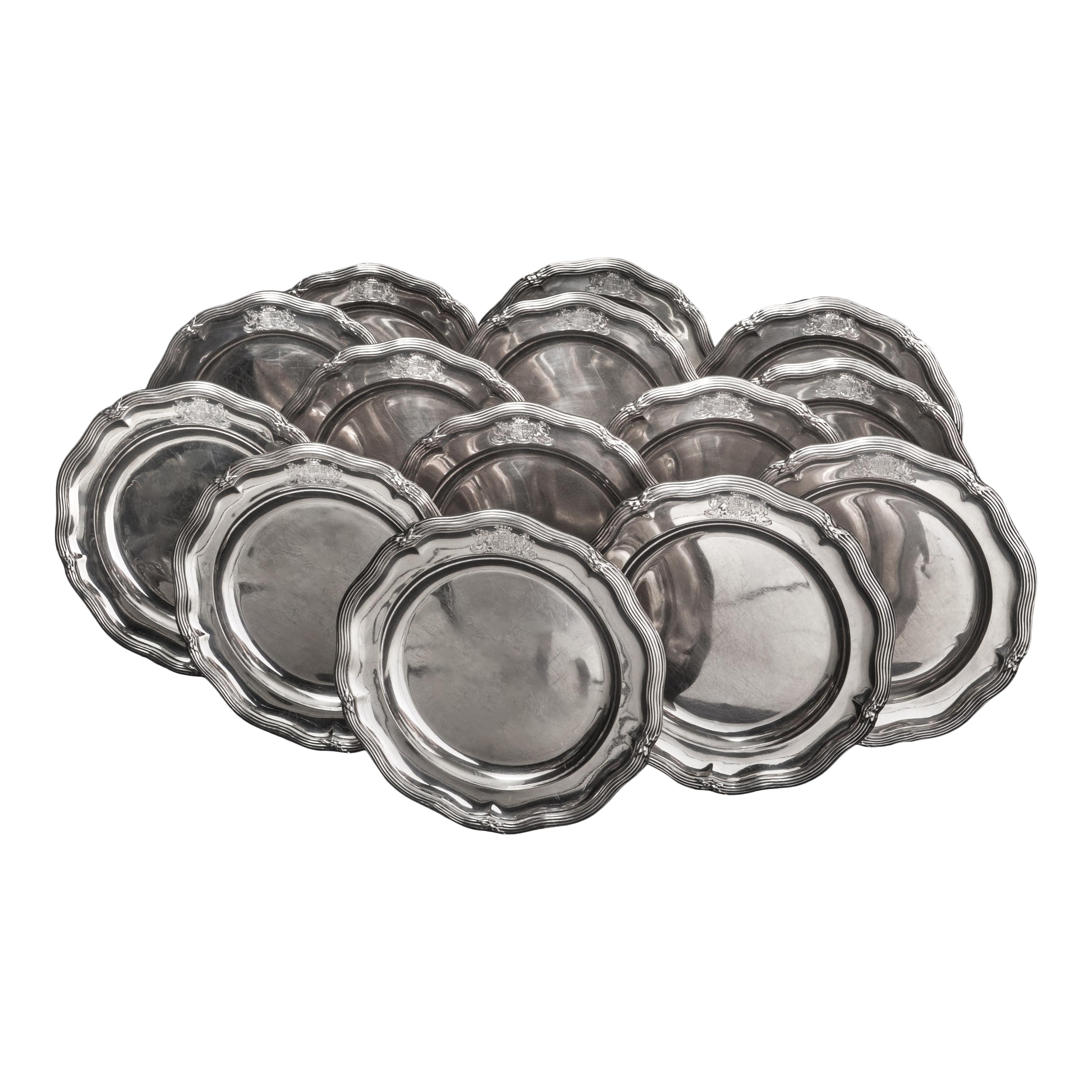 An incredibly rare set of 14 antique sterling silver Georgian plates, from the Estate of Edward Chichester 4th Marquess of Donegall and Duke of Belfast, Ireland, dated 1825. Weighing approximately 308 ounces of sterling silver.  
The plates were