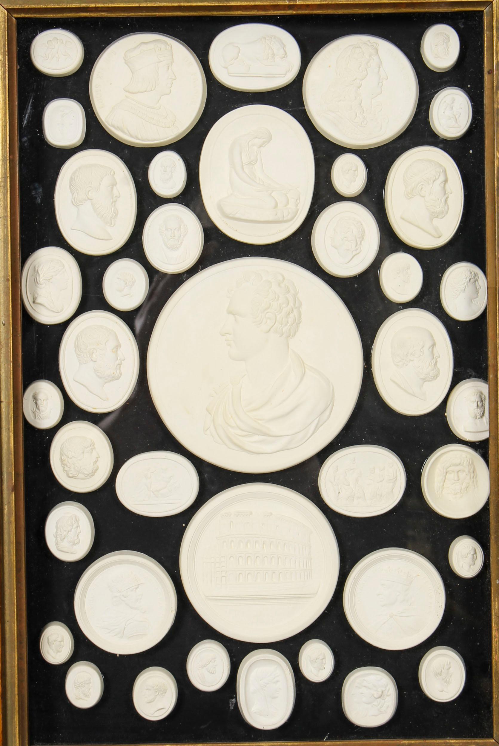 This is a truly magnificent decorative group of forty framed plaster intaglios of various antique subjects, circa 1880 in date. 
 
These forty splendid intaglios are beautifully mounted on the original black ground and set in a splendid