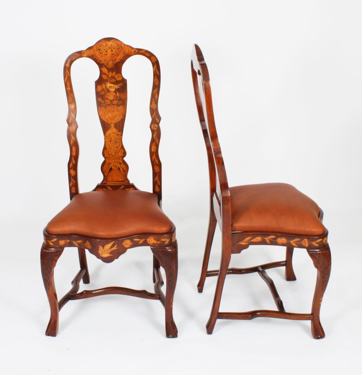 Dies ist eine wunderbare und seltene antike Satz von acht hohe Rückenlehne holländischen Nussbaum und floralen Intarsien Esszimmerstühle, CIRCA 1780 in Datum.

Das Set besteht aus acht Beistellstühlen, die kunstvoll aus massivem Nussbaum und
