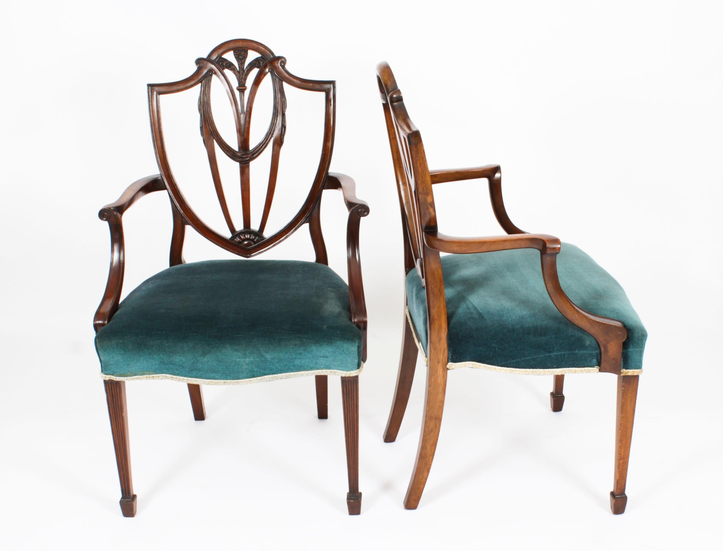 This is a fantastic antique English made set of eight mahogany shield back dining chairs of 