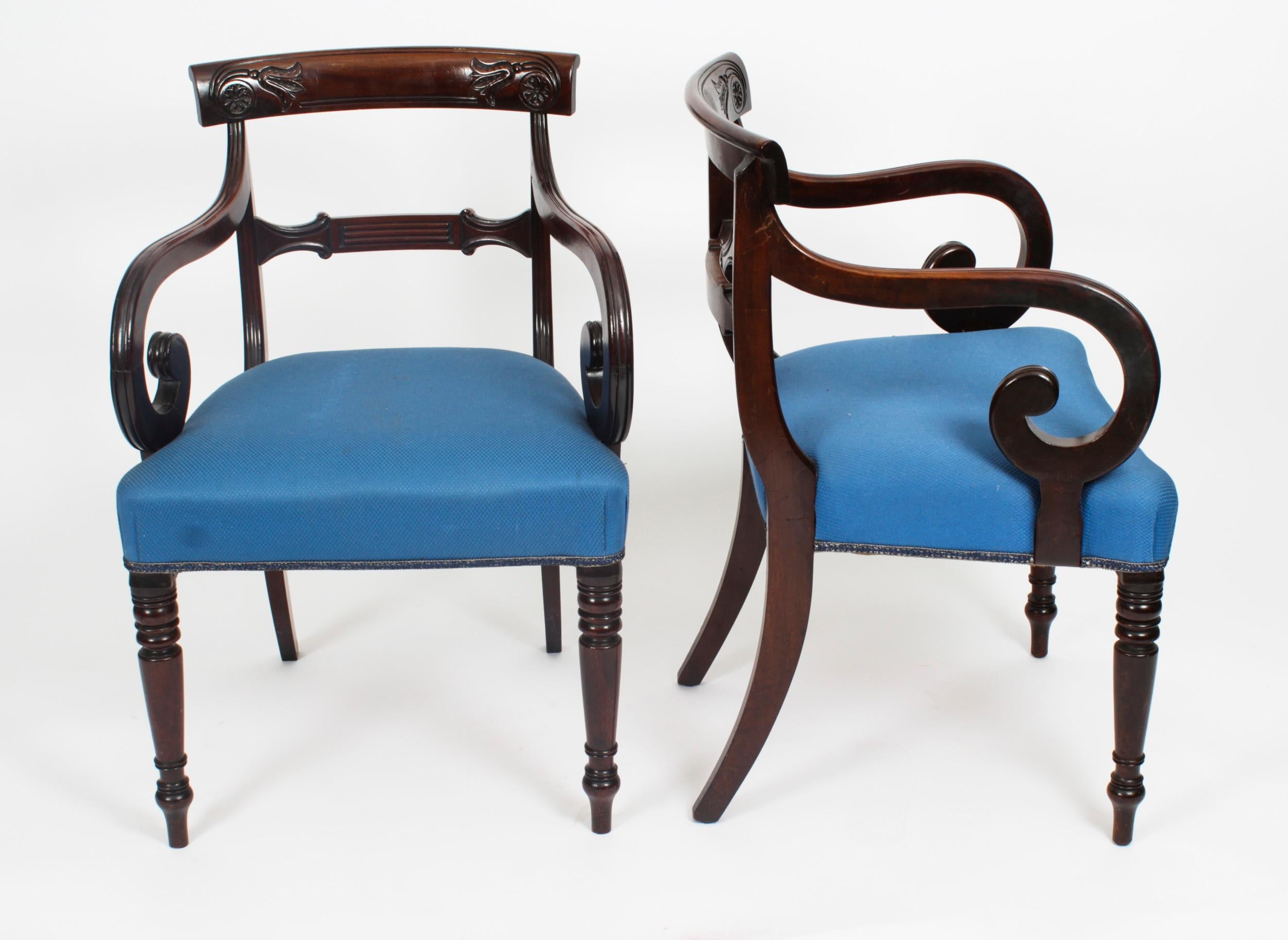 A fabulous set of eight late Regency Period mahogany dining chairs, Circa 1830 in date.
The set comprising six side chairs and two armchairs, the curved rectangular top rails with stylised floral carving. The stuff over seats are upholstered in a