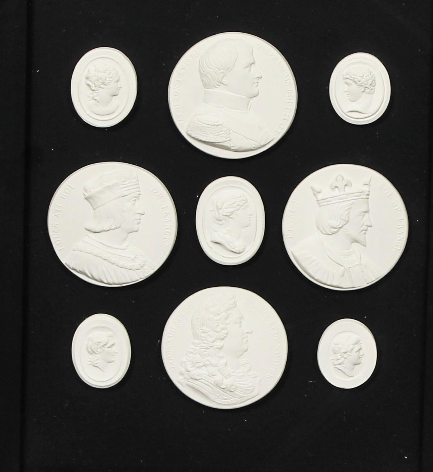 A decorative group of framed plaster Grand Tour intaglios of various historical figures dating from the 19th Century.

The intaglios are beautifully mounted on the original black ground in a rectangular gilt frame.

They consist of nine oval