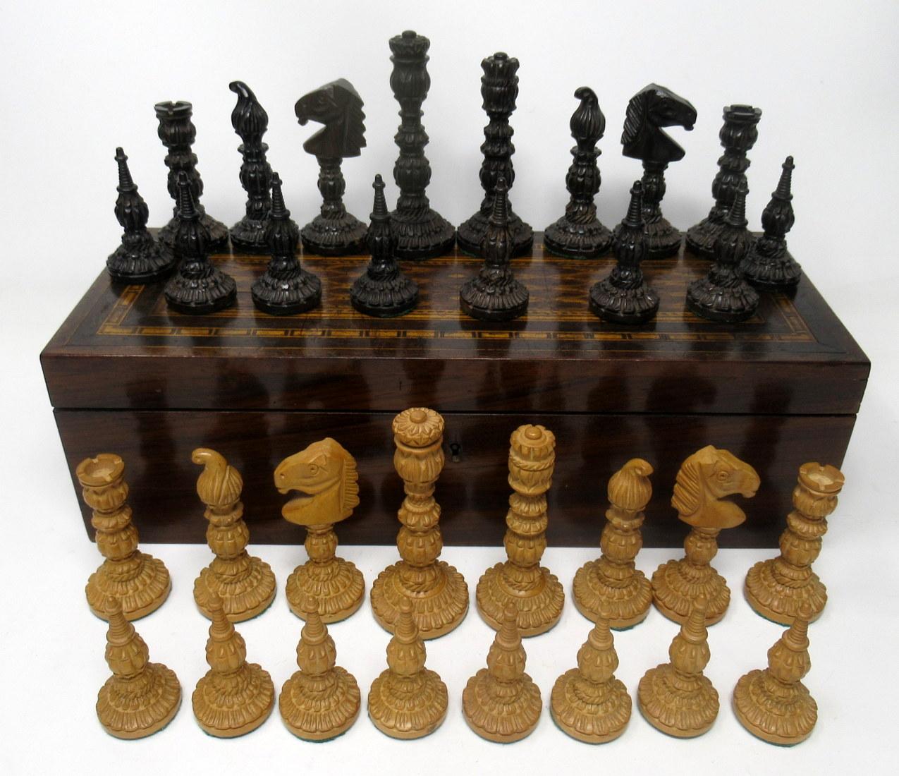 A very substantial and complete set of hand carved Jacques type Staunton pattern boxwood and dark mahogany un-weighted chess pieces of outstanding quality, late 19th, early 20th century of English origin.

Complete with possibly an earlier well