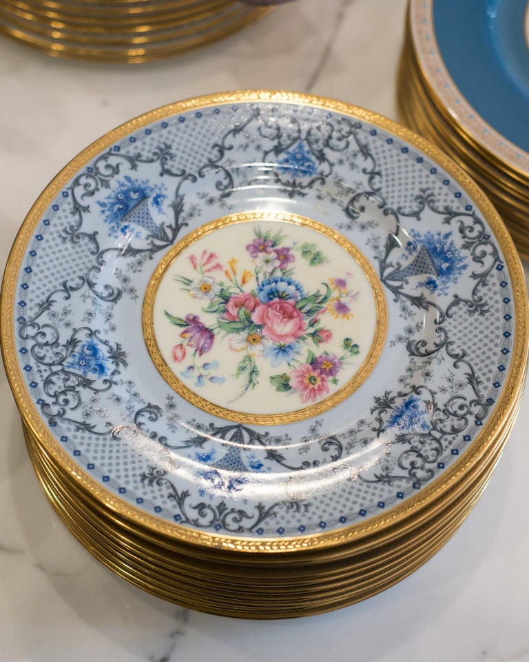 A set of 10 antique Limoges floral and gilt plates for J.E. Caldwell.