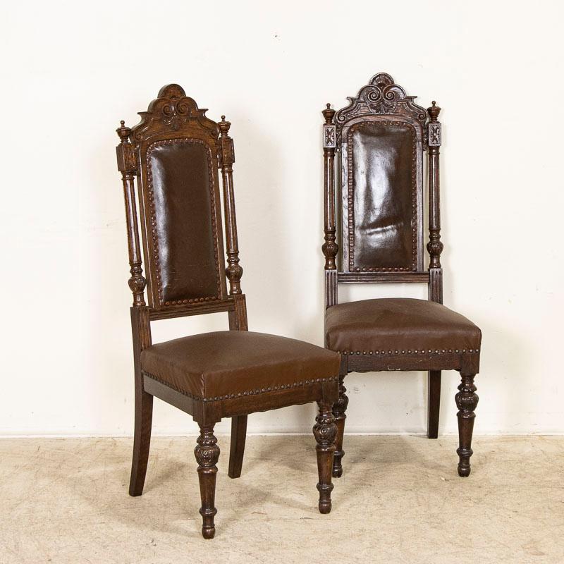 Danish Antique Set of 12 High Back Oak Brown Leather Dining Chairs with Carved Details