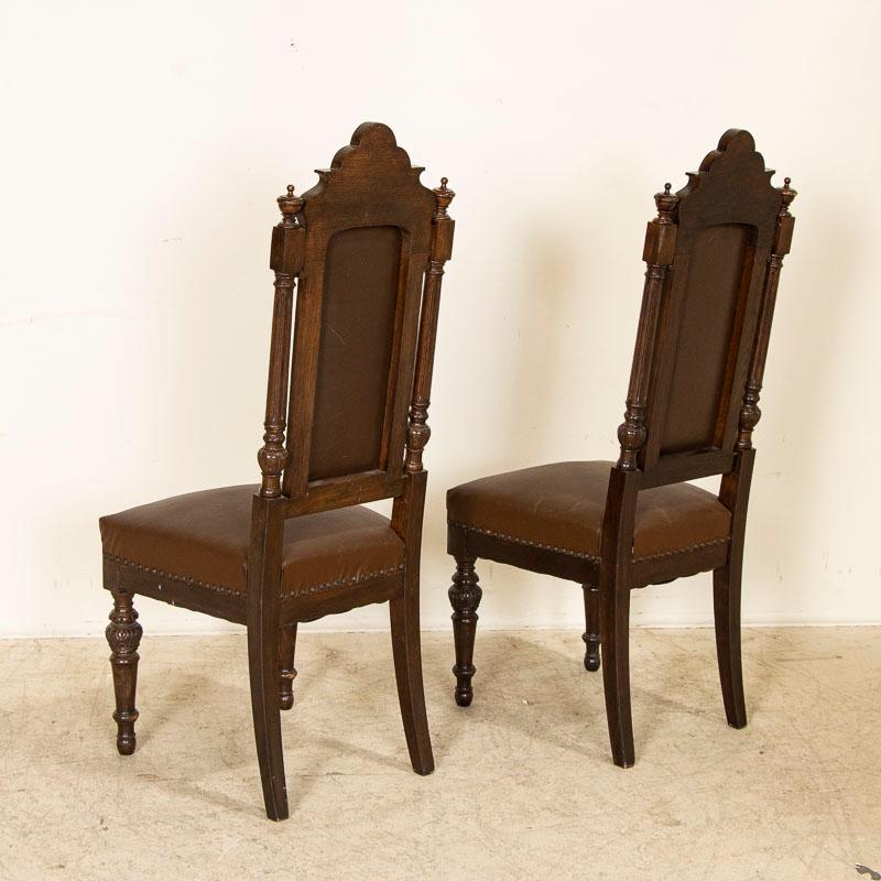 19th Century Antique Set of 12 High Back Oak Brown Leather Dining Chairs with Carved Details