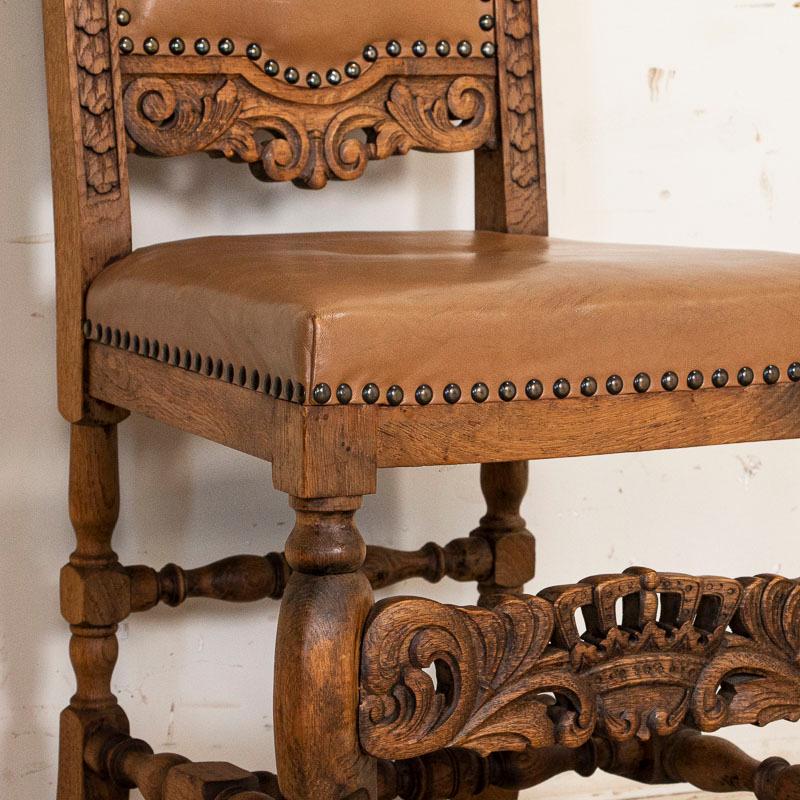 Antique Set of 12 High Back Oak Dining Chairs with Carved Crown Details In Good Condition In Round Top, TX