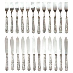 Ensemble ancien de 24 fourchettes et couteaux en argent sterling Sheffield