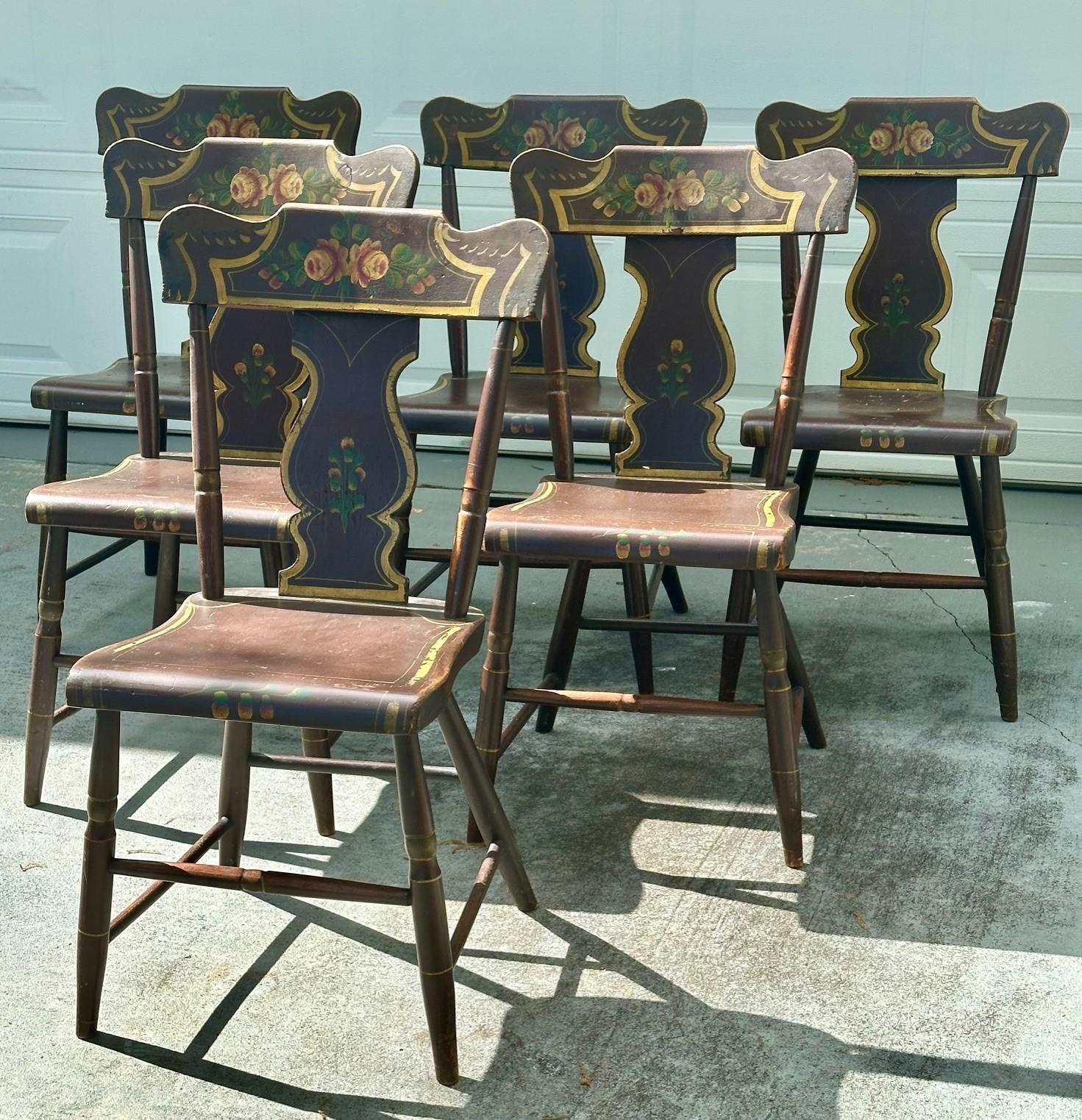 Antique Set of 6 Original Painted Pennsylvania Plank Bottom Chairs.

Rare set of six antique chairs (circa 1850) with Pennsylvania Amish origin. These are Americana at its best. They were probably built by the Lancaster County chair maker, George