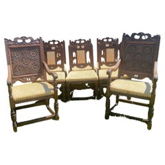Conjunto antiguo de 8 sillas de comedor de roble tallado de estilo jacobeo británico