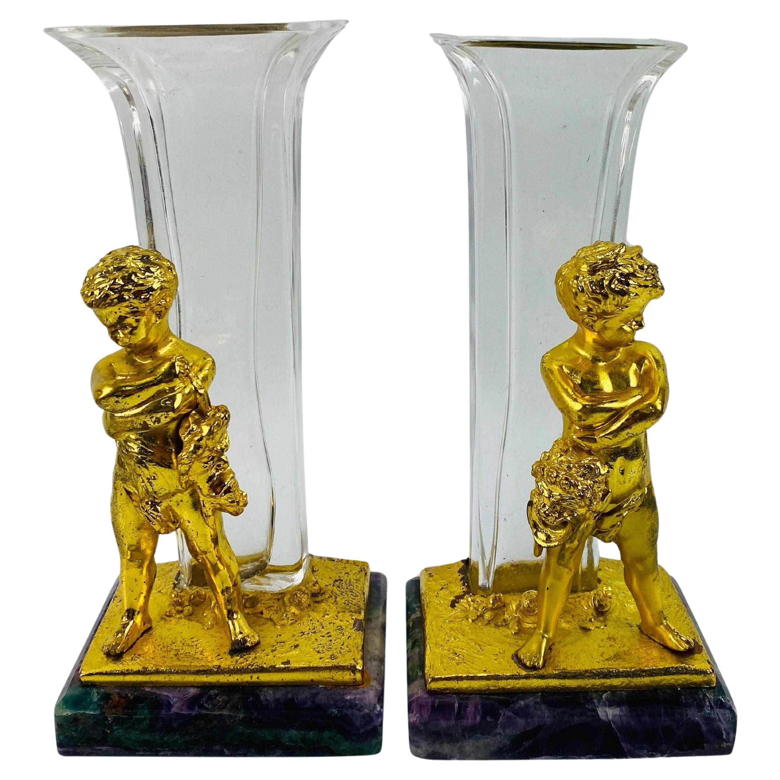 A Beautiful Little Pair of Antique Belle Epoque Gilt Bronze Cast Ormulu Angel, Cherub Puttis With Glass Posy Vases, Raised Upon a Square Polished Blue John Base, Signed To The Reverse L Kley 

Louis Kley (1833–1911) was a distinguished French