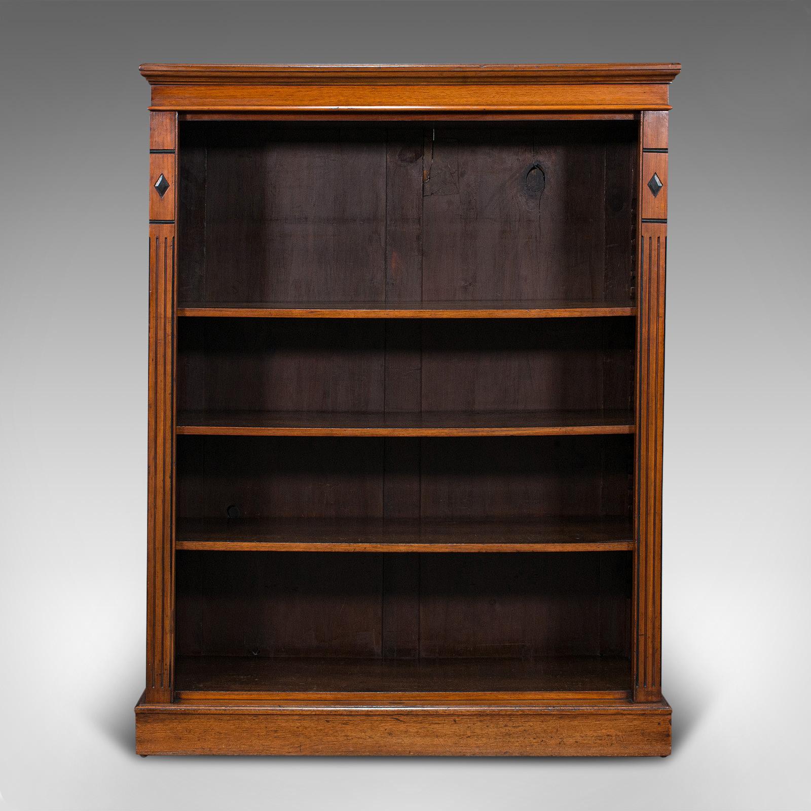 This is an antique set of bookshelves. An English, walnut open bookcase with adjustable shelves, dating to the Victorian period, circa 1880.

Attractive bookshelf with fascinating Doric overtones
Displaying a desirable aged patina and in good