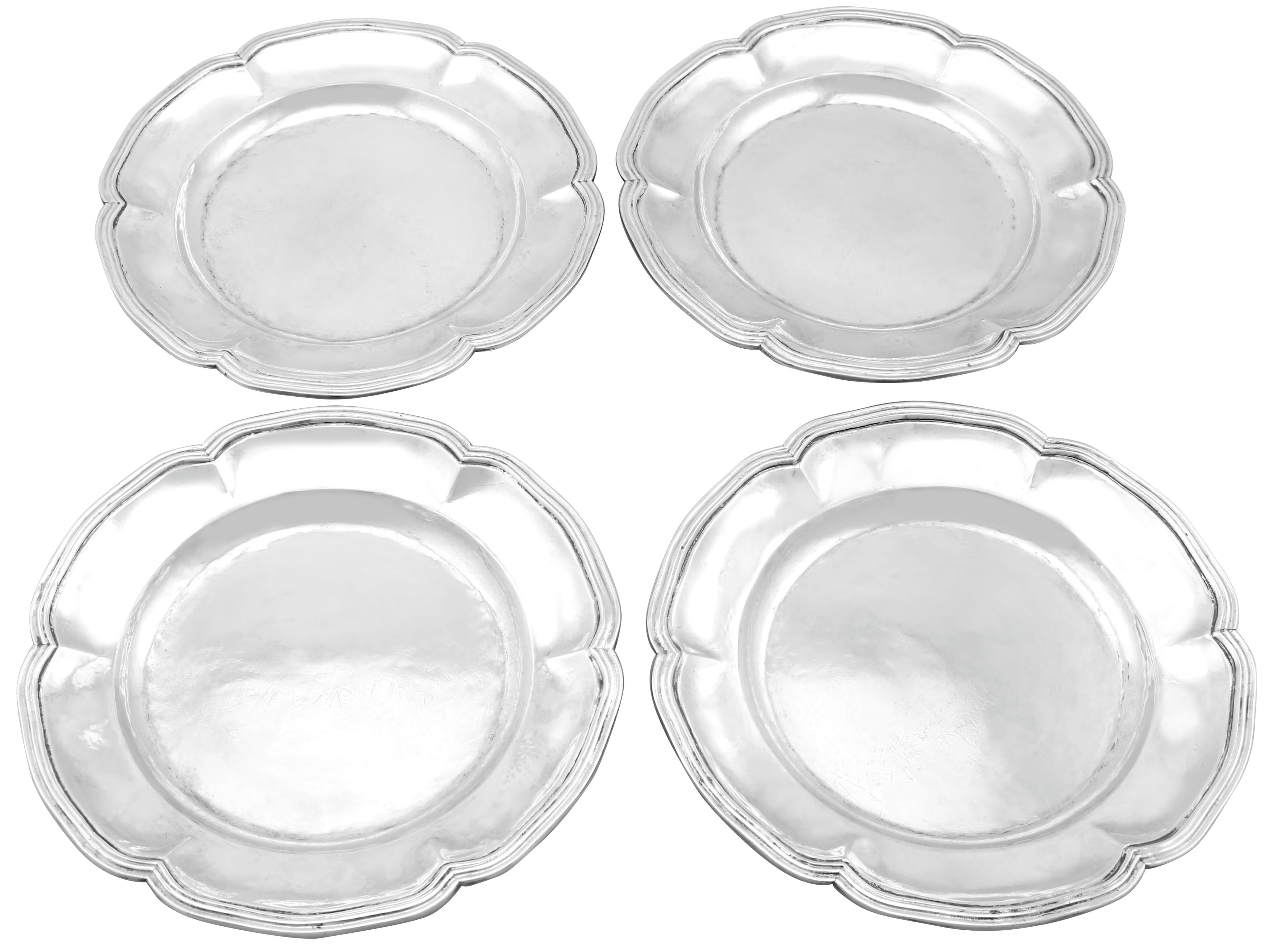 An exceptional, fine and impressive set of four antique Spanish silver dinner plates; an addition to our dining silverware collection

These exceptional antique Spanish silver plates have a circular incurved shaped form with a sunken plain