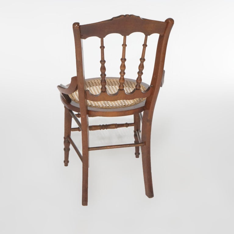 Antique Set of Four Victorian Walnut and Pressed Cane Dining Chairs