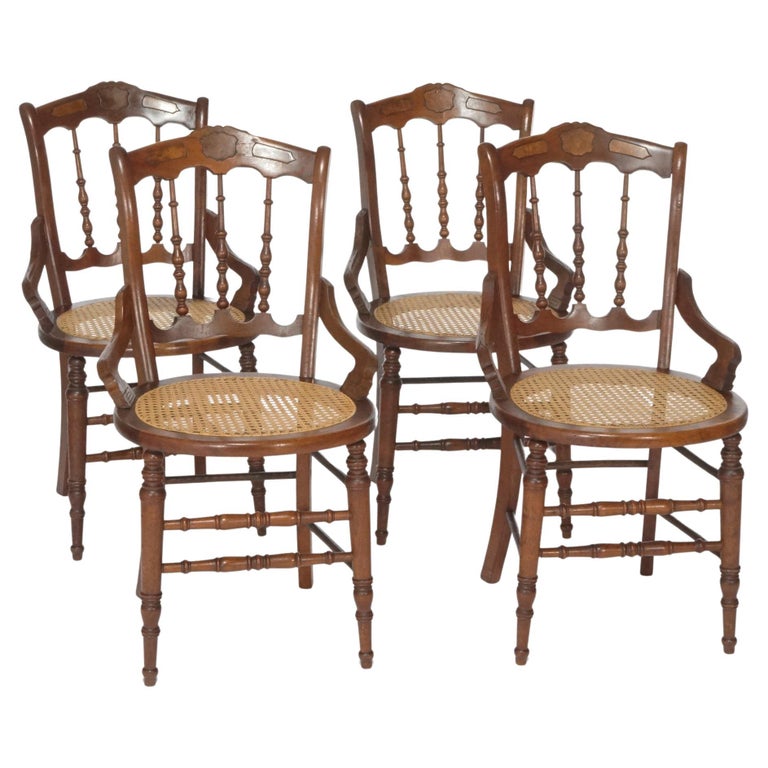 Antique Set of Four Victorian Walnut and Pressed Cane Dining Chairs