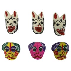 Conjunto antiguo de máscaras mexicanas de papel maché