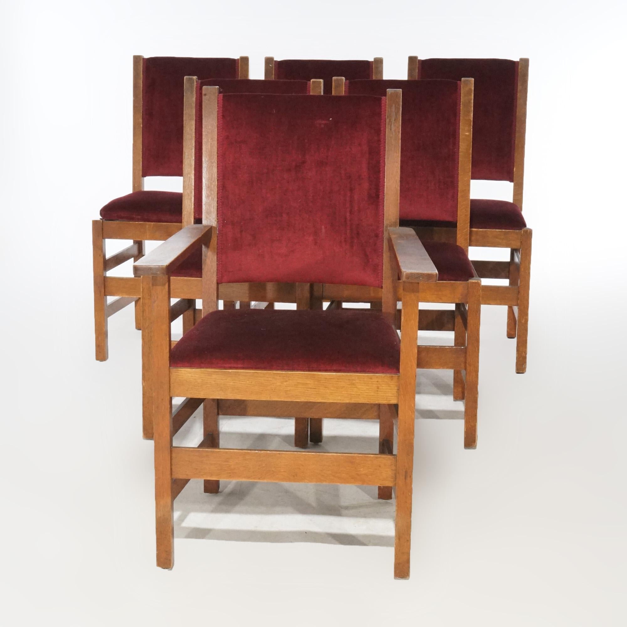 An antique set of six Arts and Crafts dining room chairs by Stickley offer oak frames with upholstered backs and seats, maker mark as photographed, circa 1910

Measure - 37.25