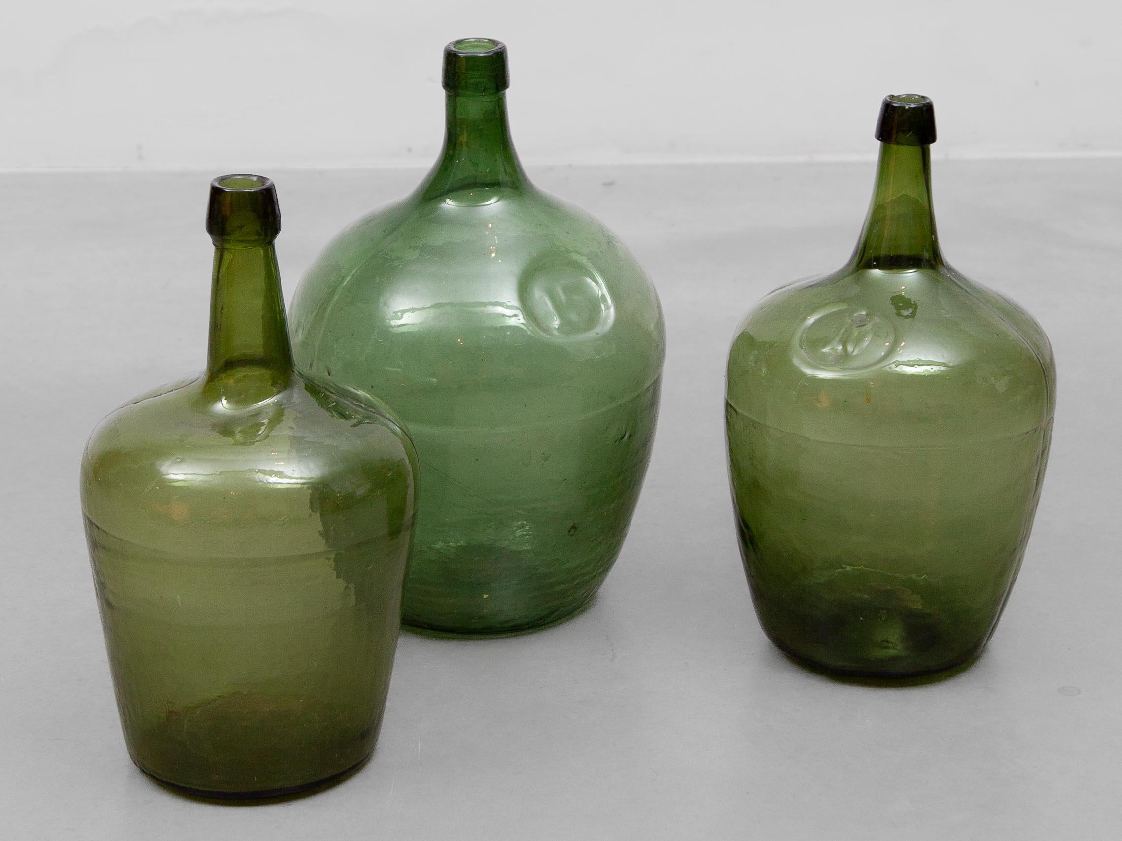 Other Antique Set of Three Green Glass Demijohn Hand Blown Bottles, Mecklenburgh