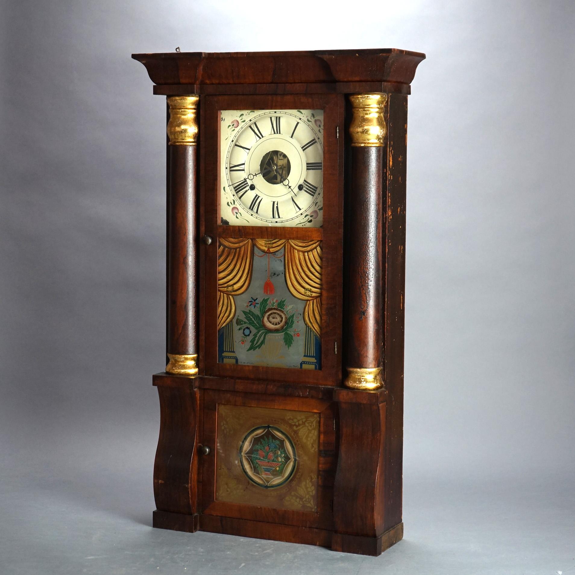 Antique Seth Thomas Flame Mahogany and Rosewood Open Escapement Mantel Clock with Flanking Columns and Eglomise Panel with Basket of Flowers, C1840

Measures - 32.5
