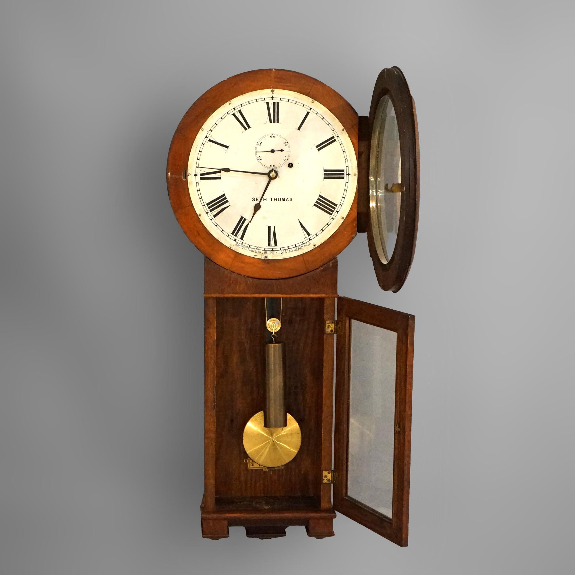 Antique Seth Thomas Oak Regulator Wall Clock Circa 1900

Measures- 36''H x 14.5''W x 5.5''D