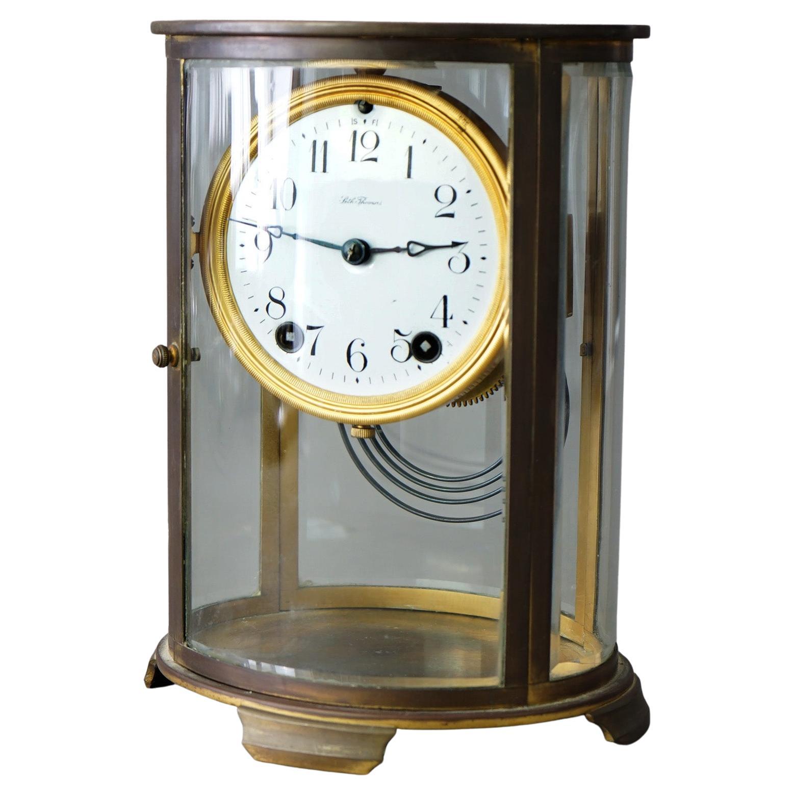 Ancienne horloge de cheminée ovale Seth Thomas avec boîtier en cristal