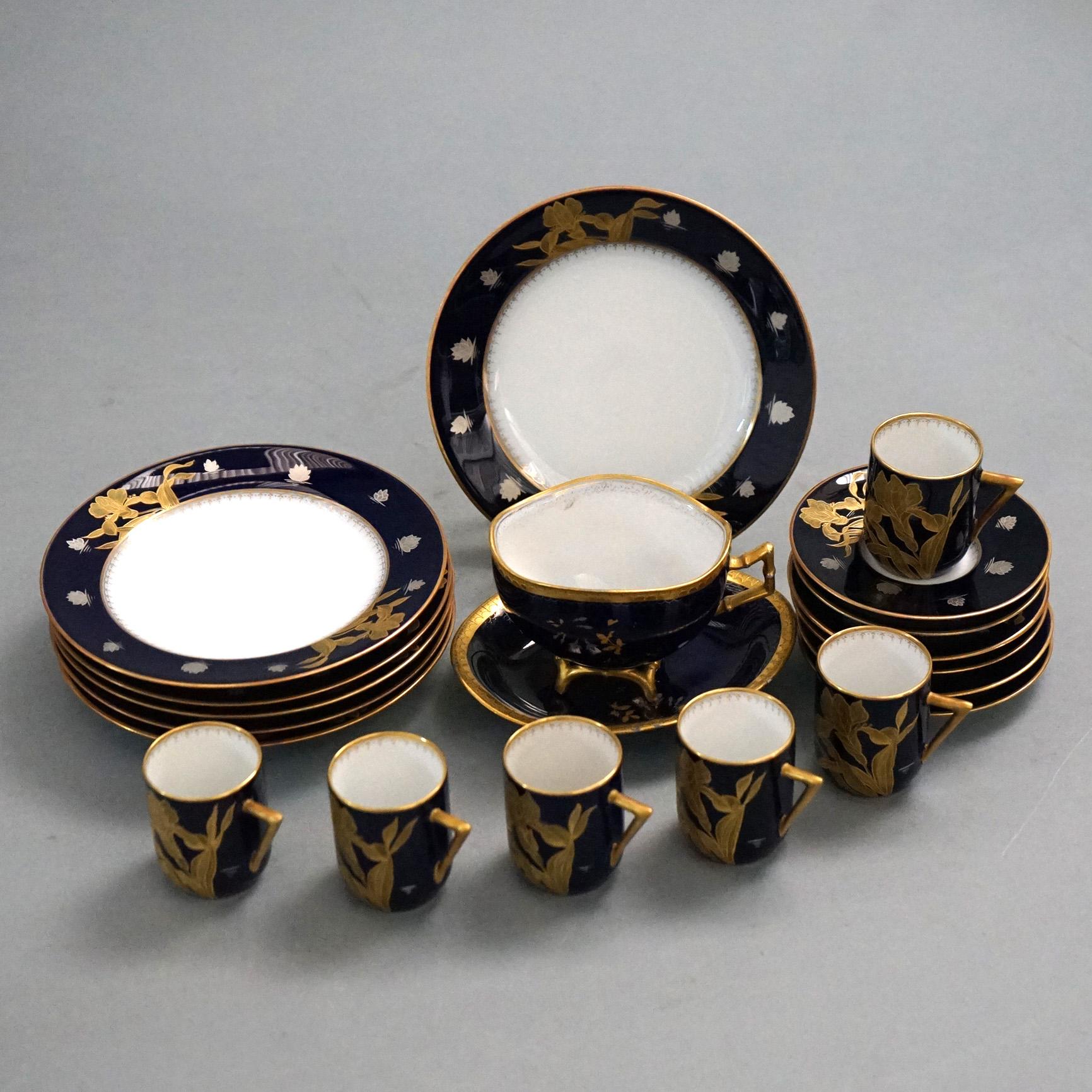 An antique 20 piece set of French Sevrés Japonism demitasse set offers porcelain construction with gilt lilies, en veso makers mark as photographed; c1900

Set includes:
6 plates 6.25