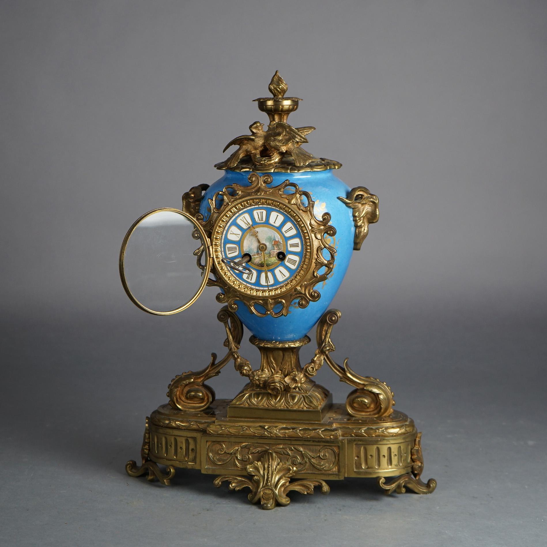 Antique French Sevres Bronze Mounted Figural Aqua Porcelain Mantle Clock with Cherubs and Foliate Elements, C1880

Measures- 19.75''H x 15.25''W x 7''D