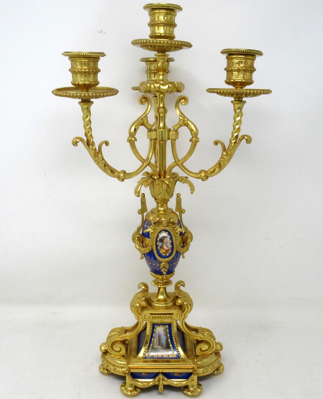 A fine stylish and imposing French four light table or mantle sevres porcelain mounted ormolu candelabra of outstanding quality. Early to Mid-Nineteenth Century. 

With three scrolling leaf capped and one central branch above a porcelain urn. Each
