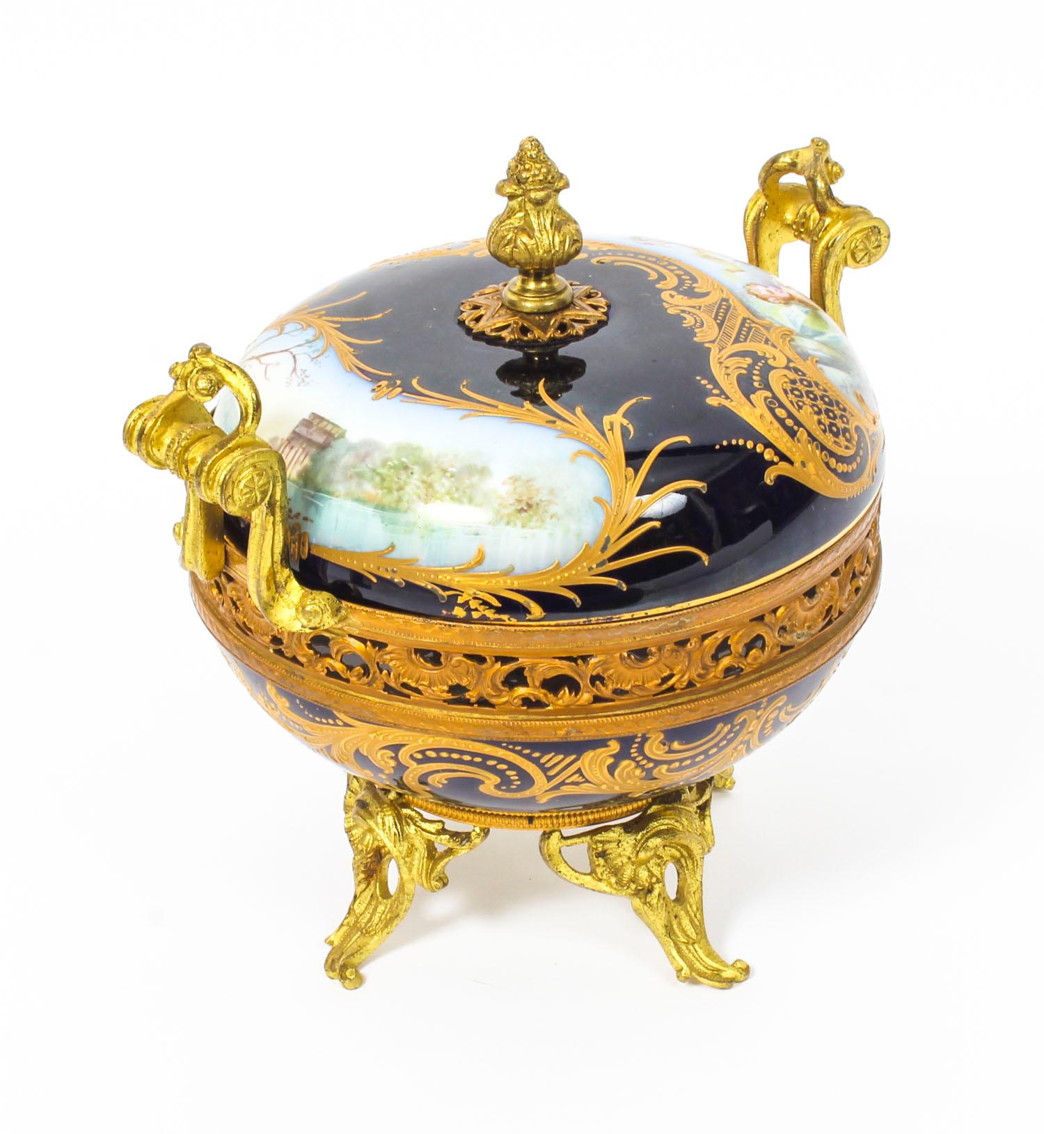 A 19th century Louis Philippe serves porcelain Pot-Pourri decorated with a lady and cherub, having pierced ormolu mounts and feet; fully marked inside the lid 20 cm high, 18 cm high, 17cm diameter.

This is a beautiful French 19th century Louis