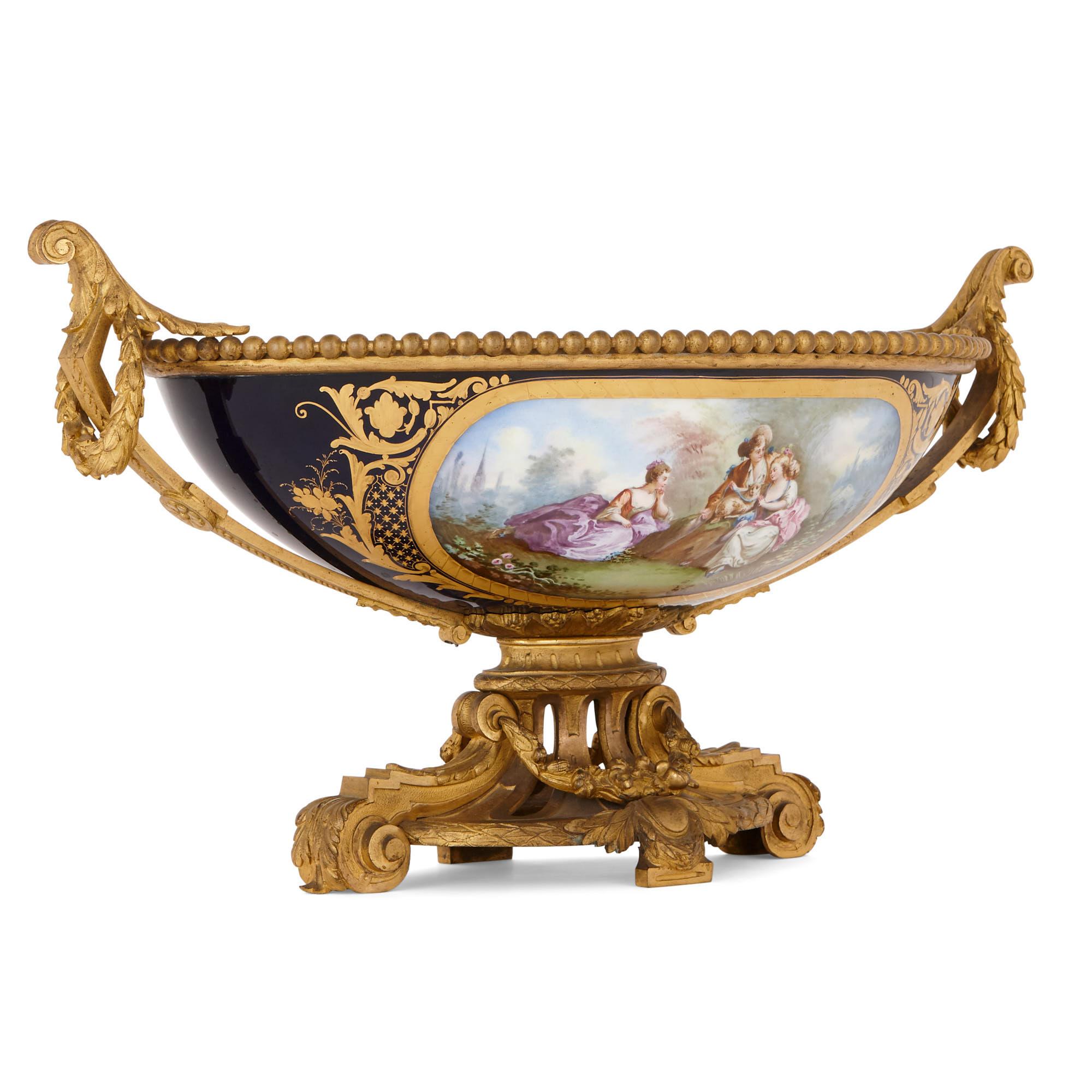 This stunning centrepiece bowl was created in France in the late 19th century. It is fashioned after 18th-Century wares, produced by the prestigious Sèvres Porcelain Manufactory. Typical of such items, this centrepiece is designed in an elegant