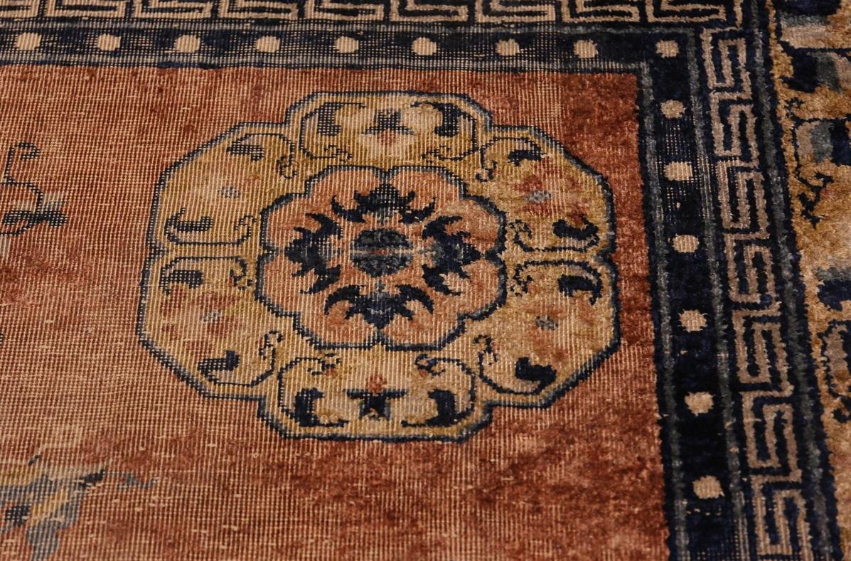 Beautiful antique shabby chic silk Chinese rug, country of origin / rug type: antique Chinese rug, date circa 1900. Size: 6 ft 1 in x 9 ft 8 in (1.85 m x 2.95 m)

There is nothing that matches the beauty of an antique Chinese silk rug. This