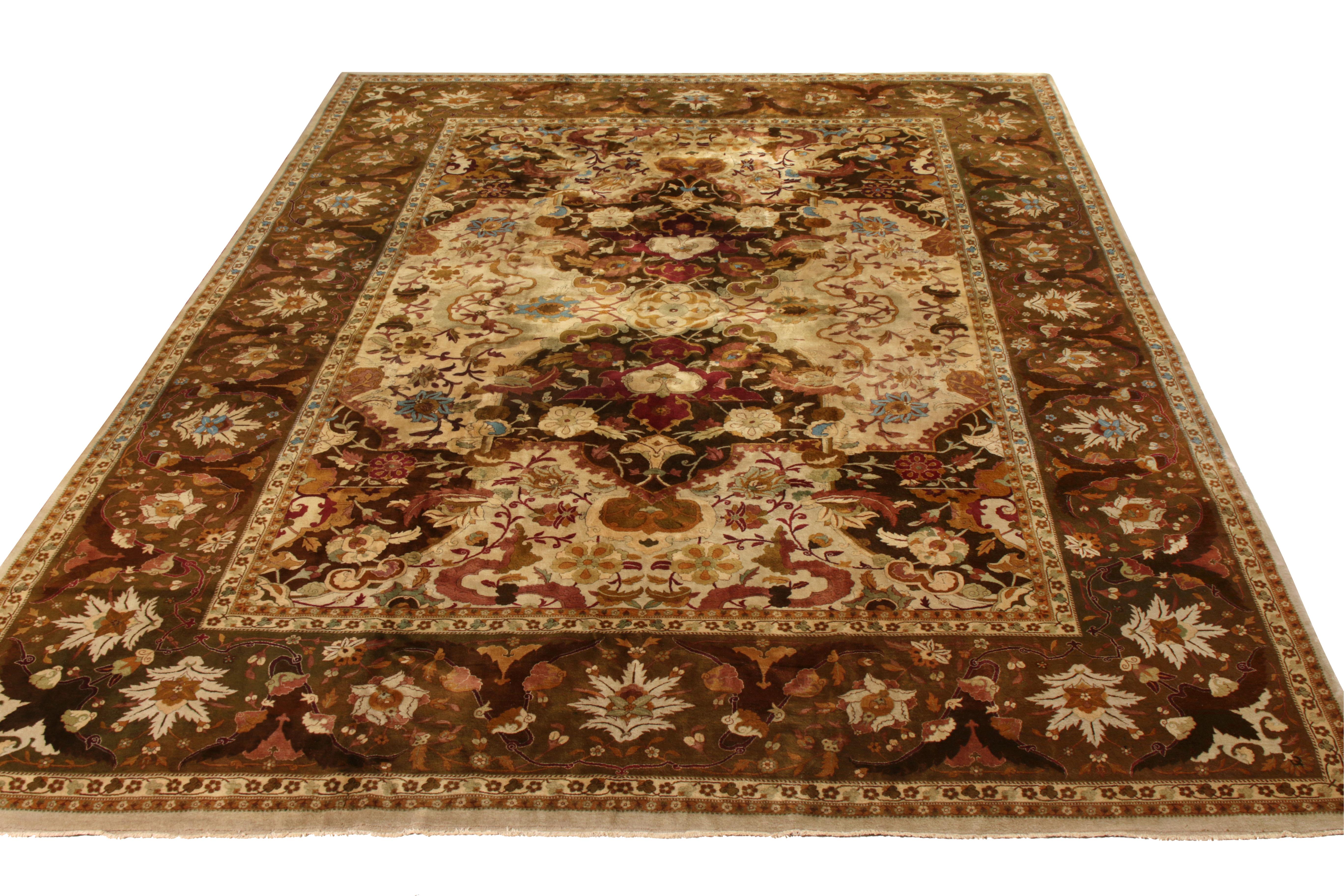 Hand-knotted in wool circa 1910-1920, this antique 10x13 rug is a rare Indian interpretation of Persian Shahrestan rugs—a new unveiling. 

On the Design: 

This piece enjoys a regal air with fine details in dense floral patterns on beige and brown