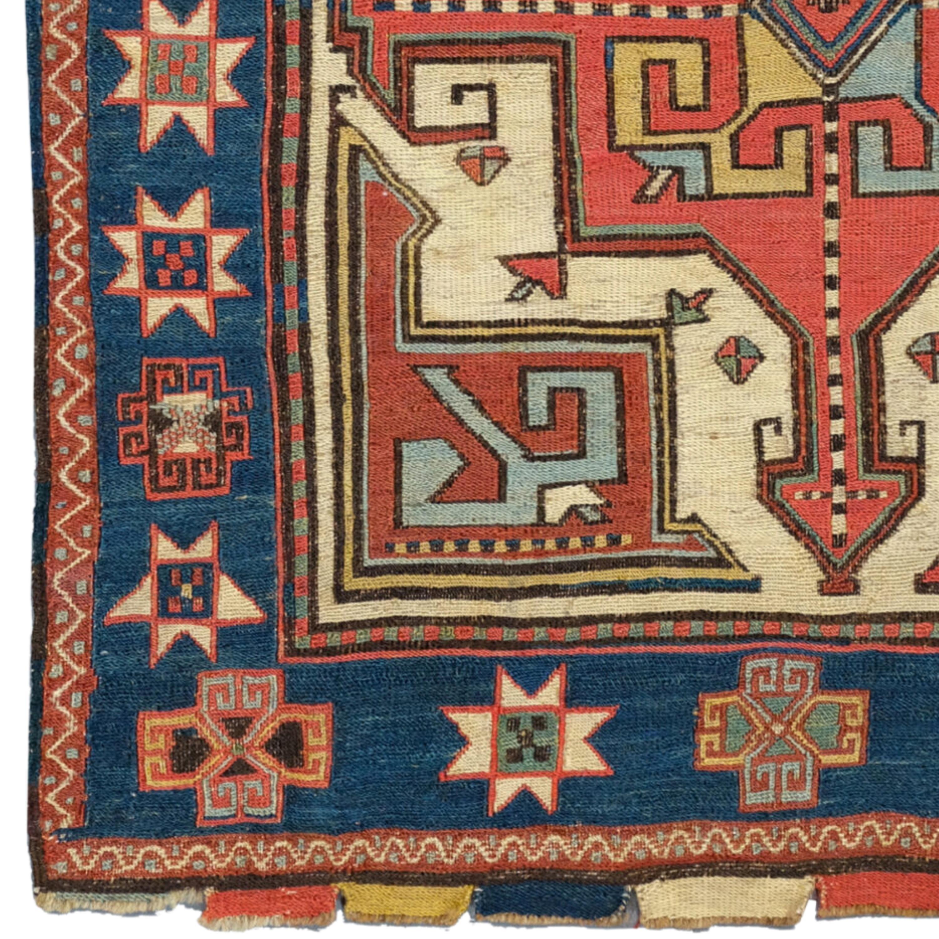 Antique Shahsavan Bag Face | Caucasian Rugs
Size : 52×58 cm (20,4x22,8 In)

Finely woven in the sumakh technique, this half of a Moghan Shahsavan double bag displays a box-shaped medallion decorated with arrows and a main border of hooked diamonds.